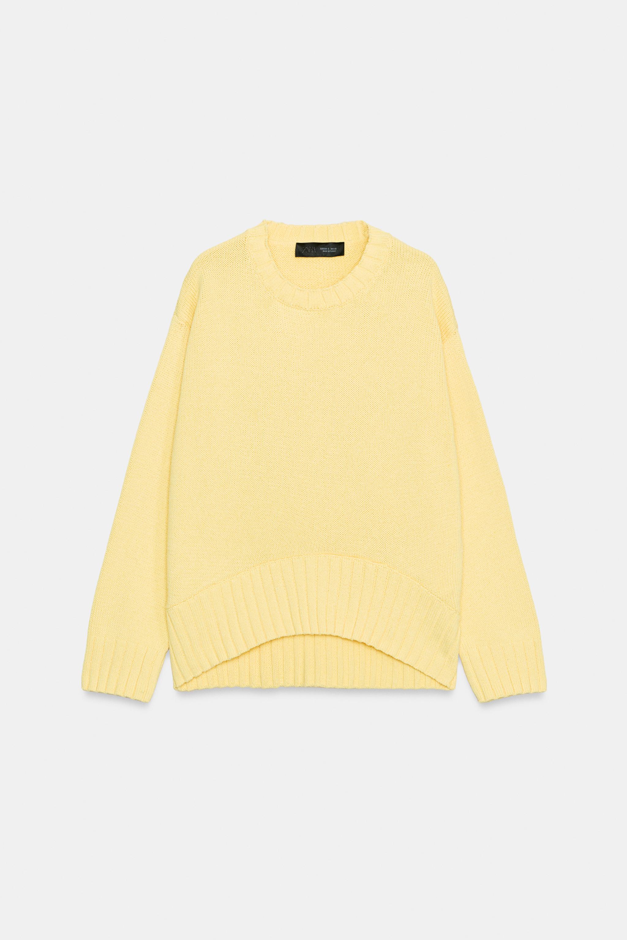 ASYMMETRIC HEM KNIT SWEATER