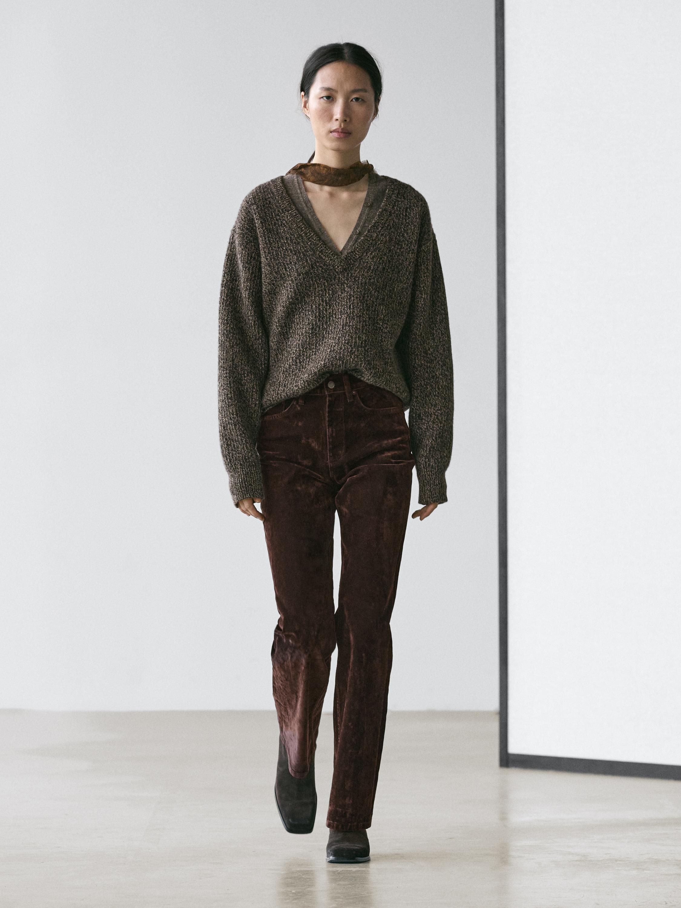 High-waist flocked boot-cut jeans