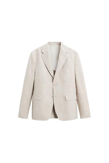 Front view of a beige blazer with lapels and front flap pockets.