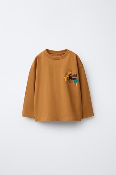 CAMISETA ESTAMPADO DINOSAURIOS - Caramelo de Zara
