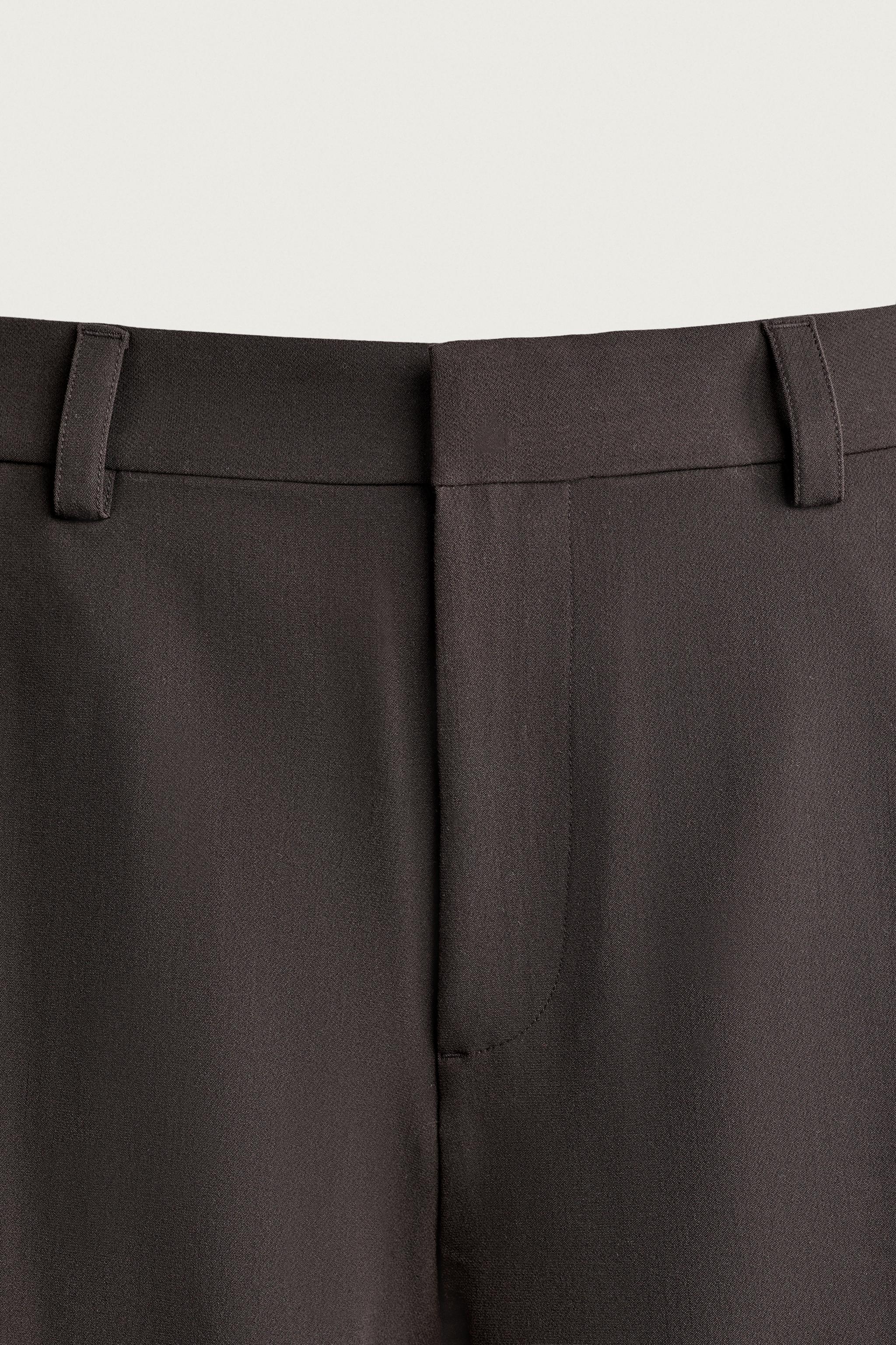 PANTALON COUPE LARGE PLIS LATÉRAUX