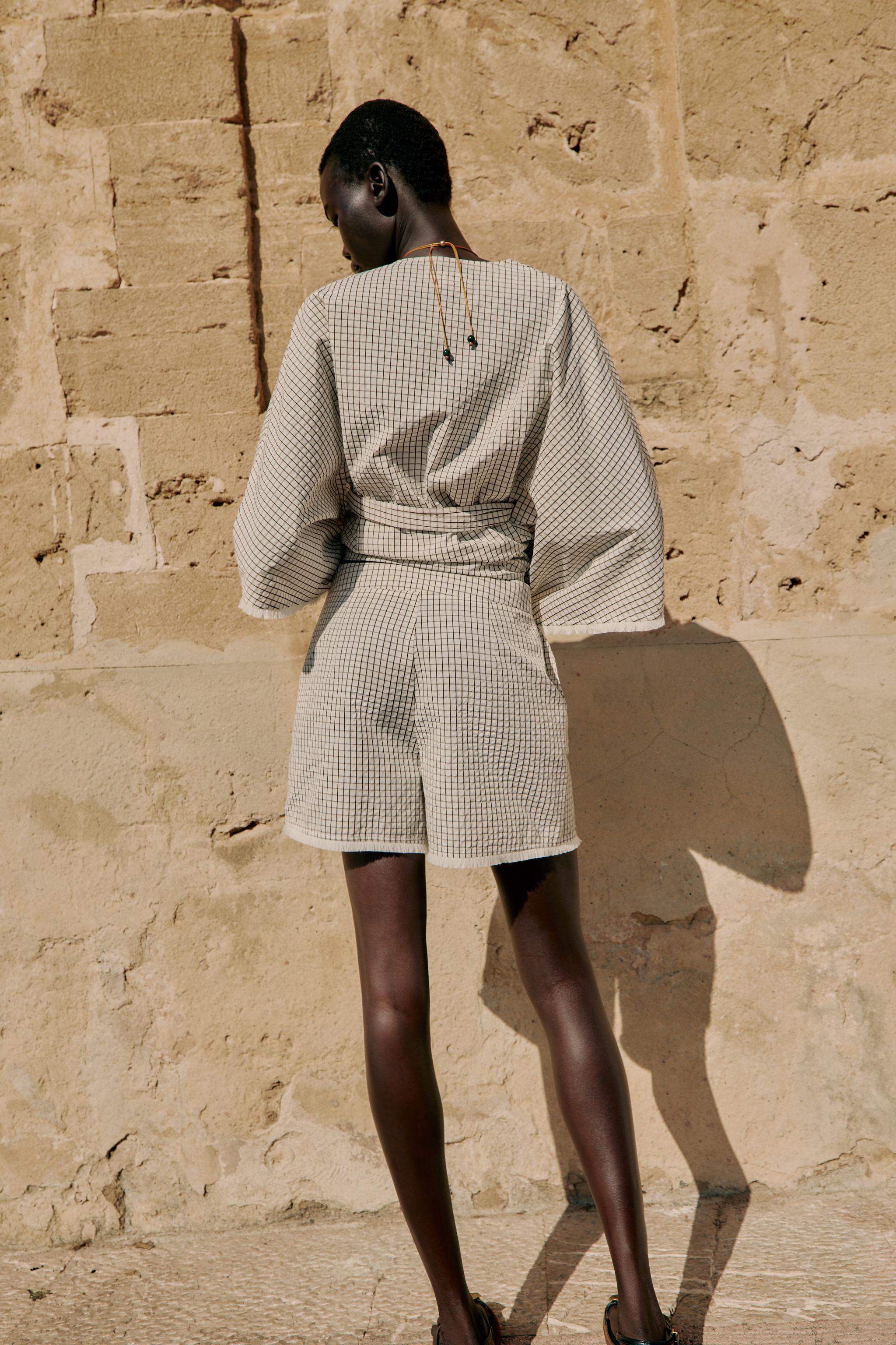 SHORT À CARREAUX EFFRANGÉ