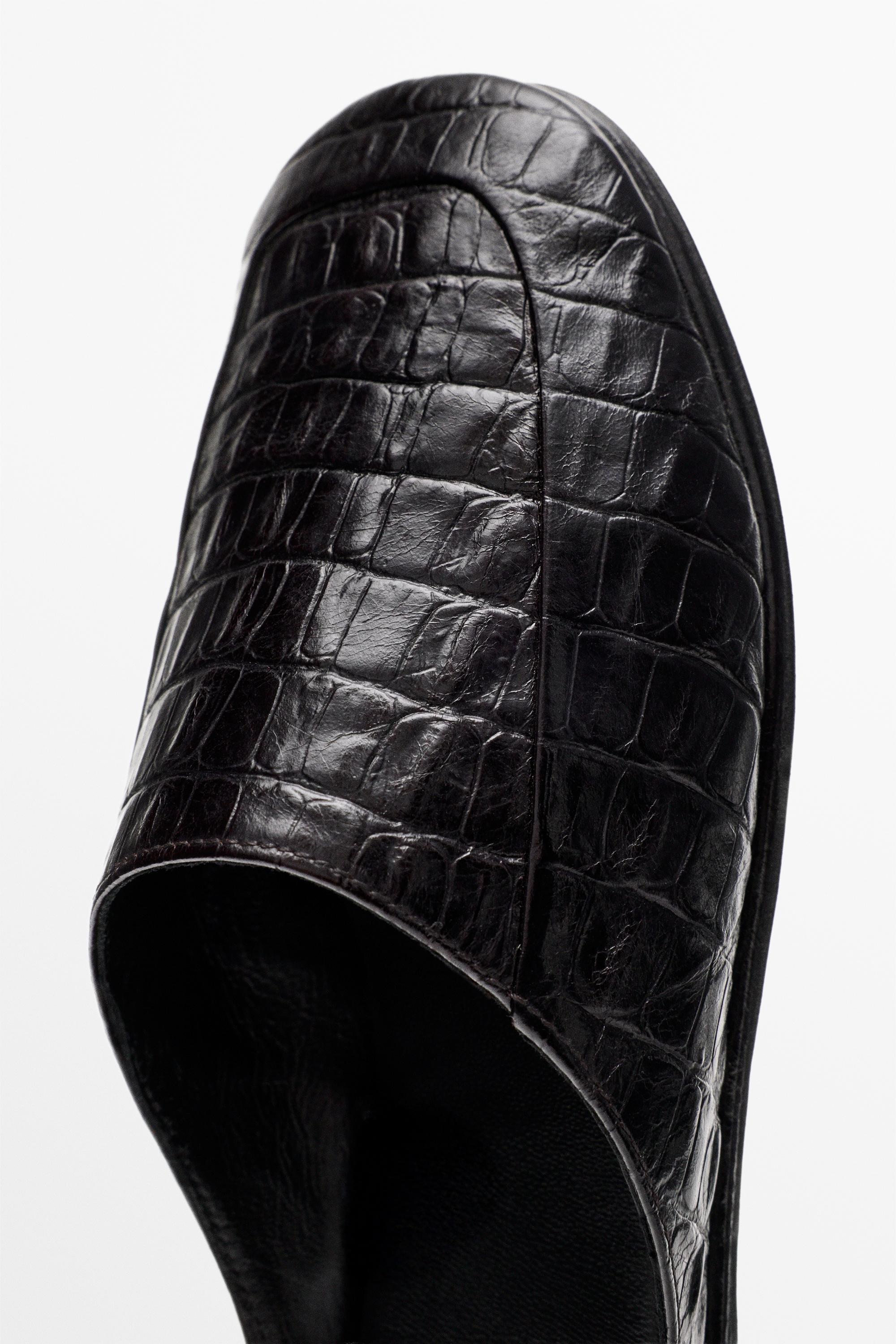 Mules en cuir façon croco
