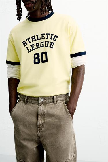 CAMISETA RIB CONTRASTE TEXTO - Amarillo de Zara - Imagen 0