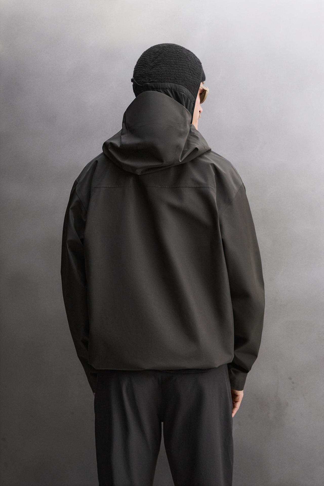 WATERPROOF TECHNICAL JACKET — Black
