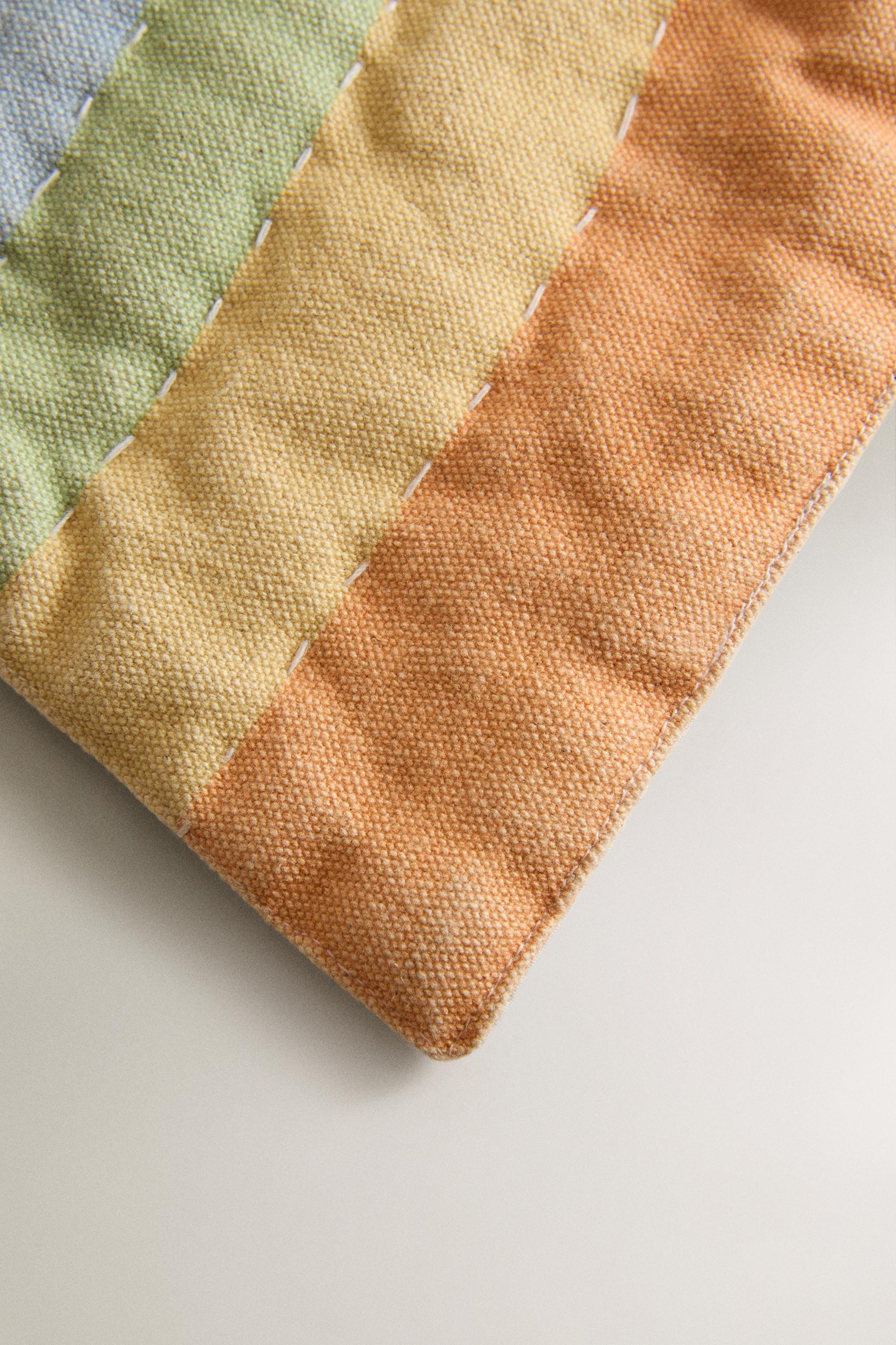 KIDS' RAINBOW PLACEMAT — Ecru