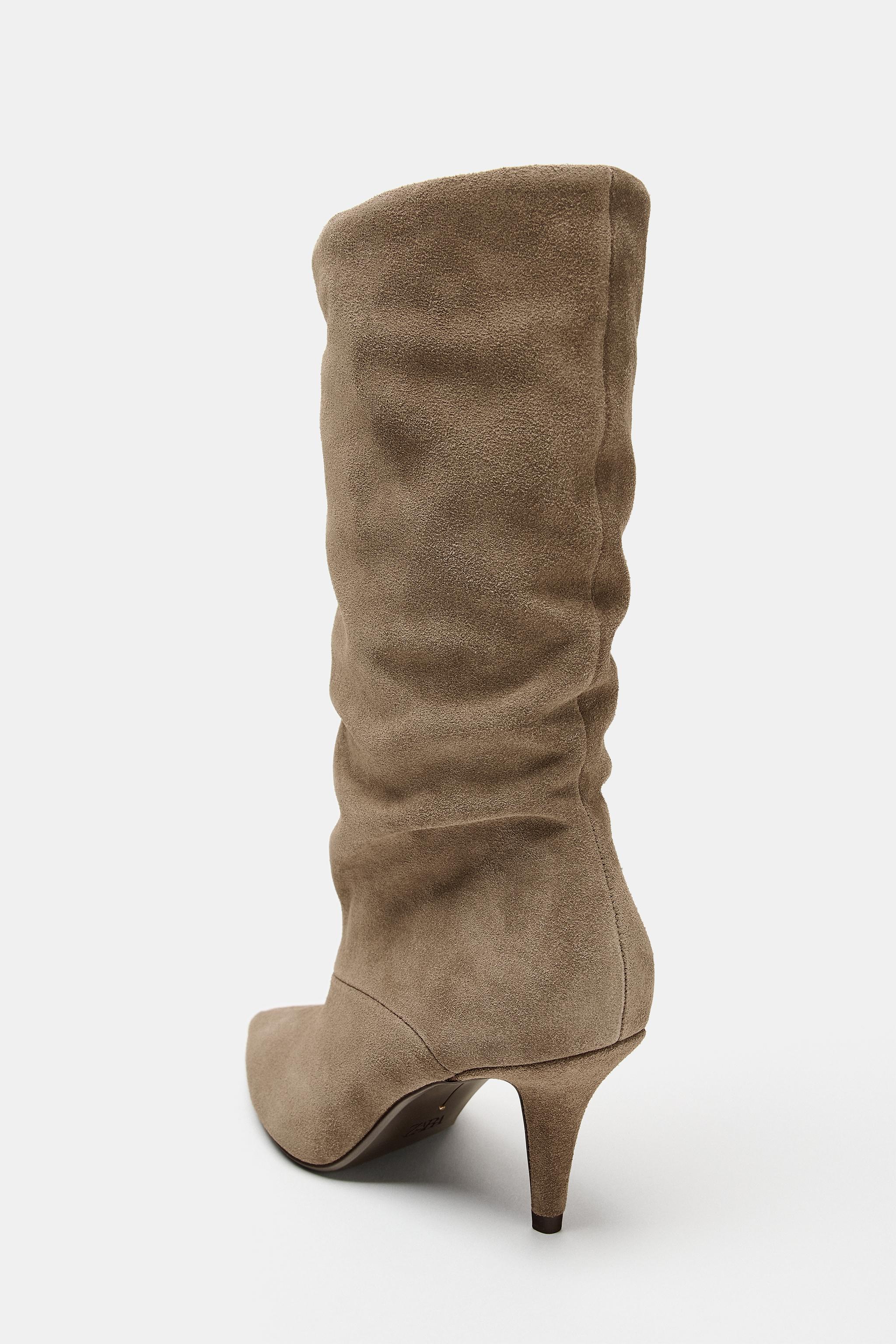 BOTTES À TALONS FRONCÉES EN CROÛTE DE CUIR
