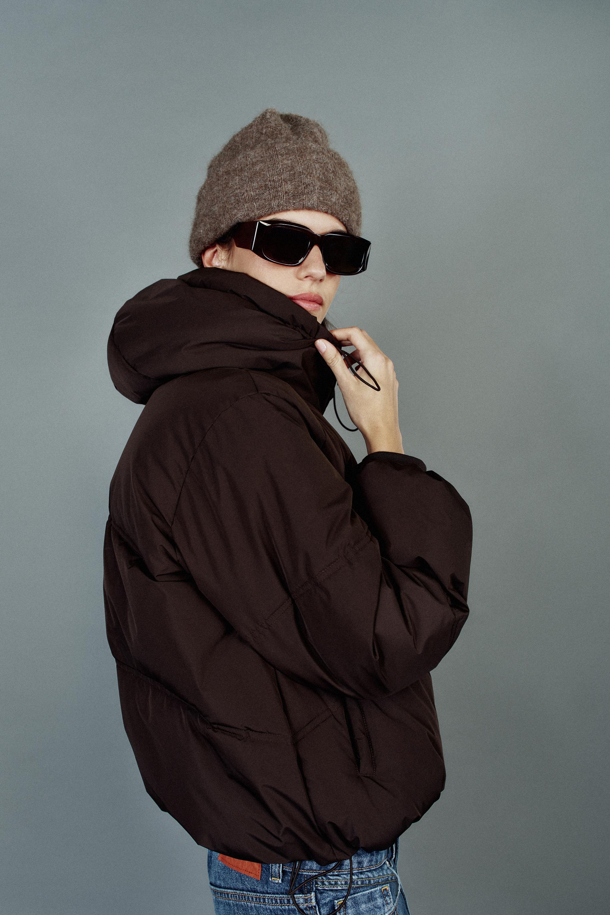 ANORAK MATELASSÉ À CAPUCHE DÉPERLANT ET COUPE-VENT