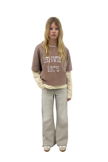 KAVBOJKE NA ZVONEC Z ZAKOVICAMI -  de Zara - Slika 0