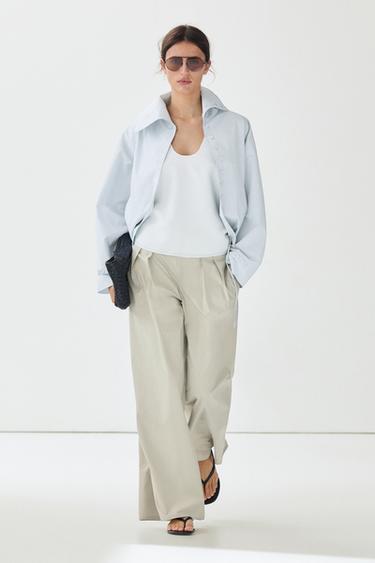 Pantalón ancho pliegues detalle fajín - salmon/oscuro de Zara - Imagen 0