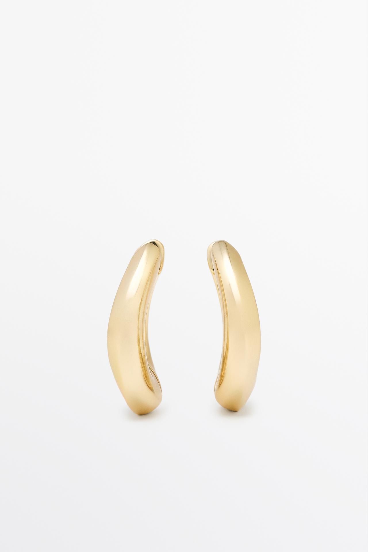 Voluminous hoop earrings — Golden