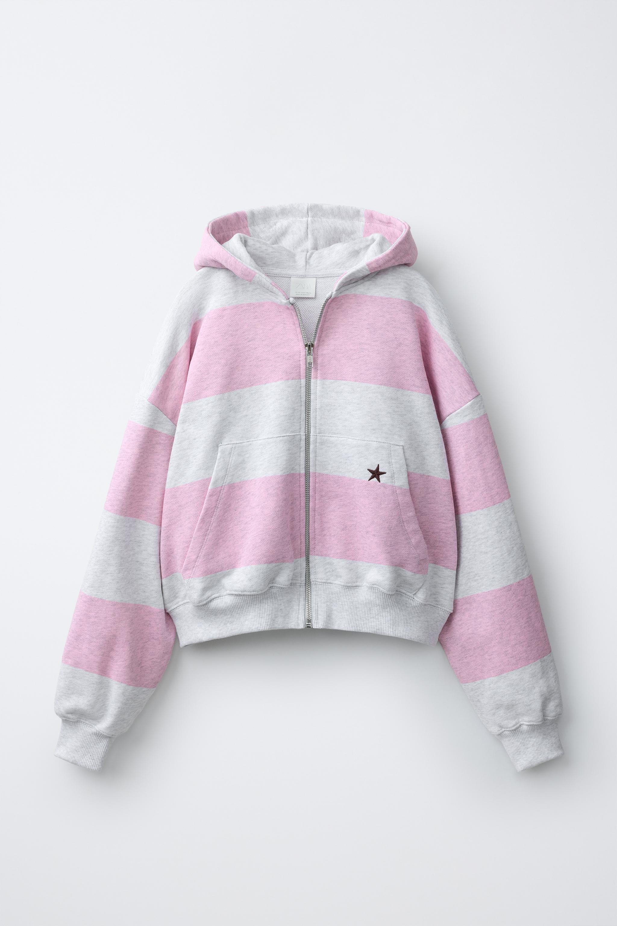 SWEAT ZIPPÉ À RAYURES ET PIÈCE