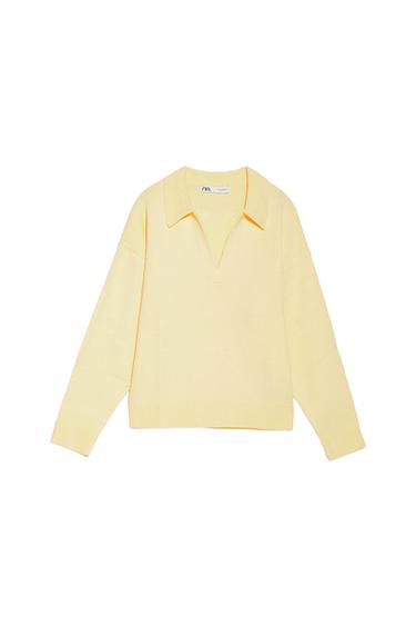 Light yellow V-neck long-sleeved jumper. Visible label on the collar with text "ZARA". White background.