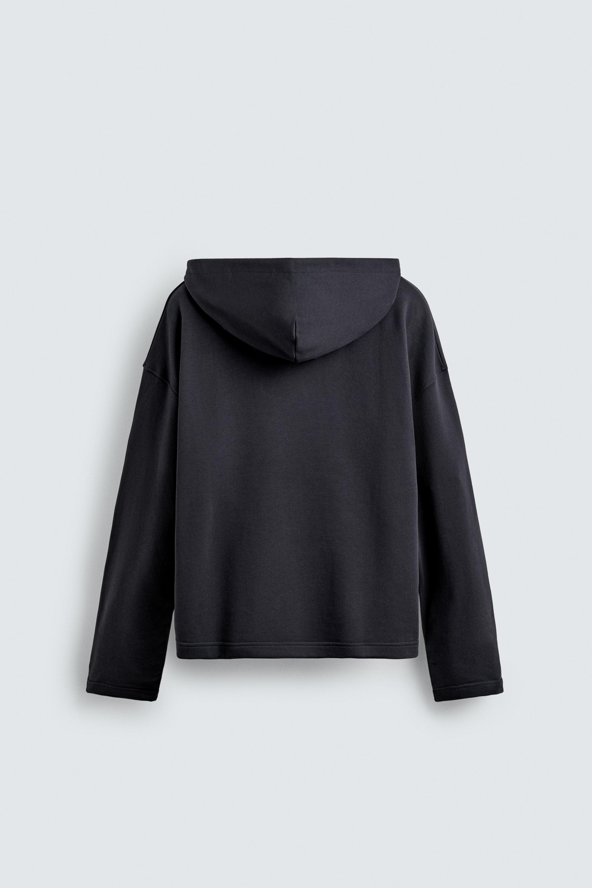 TEXTURED DRAWSTRING SWEATSHIRT