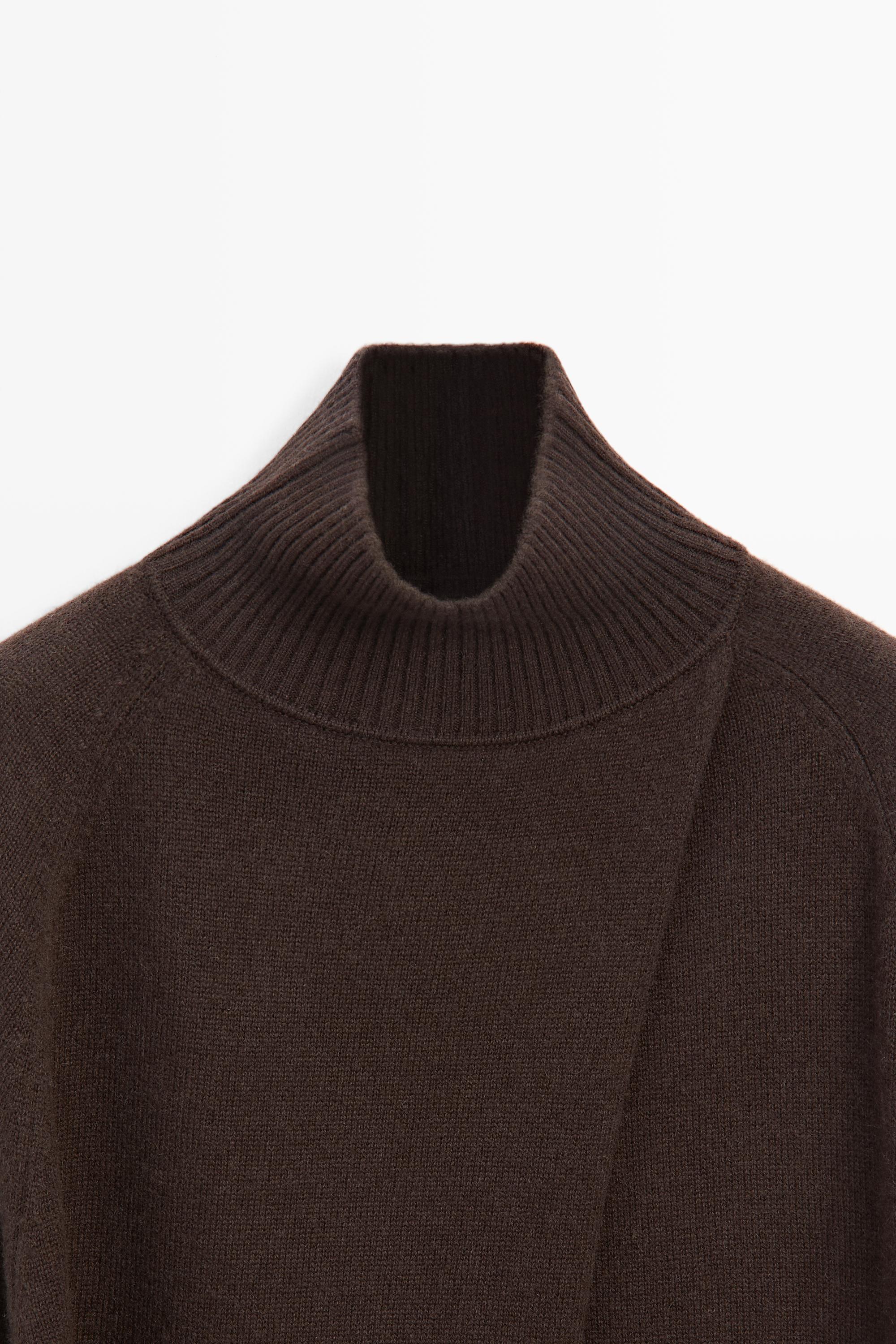 100% cashmere knit cape with crossover detail