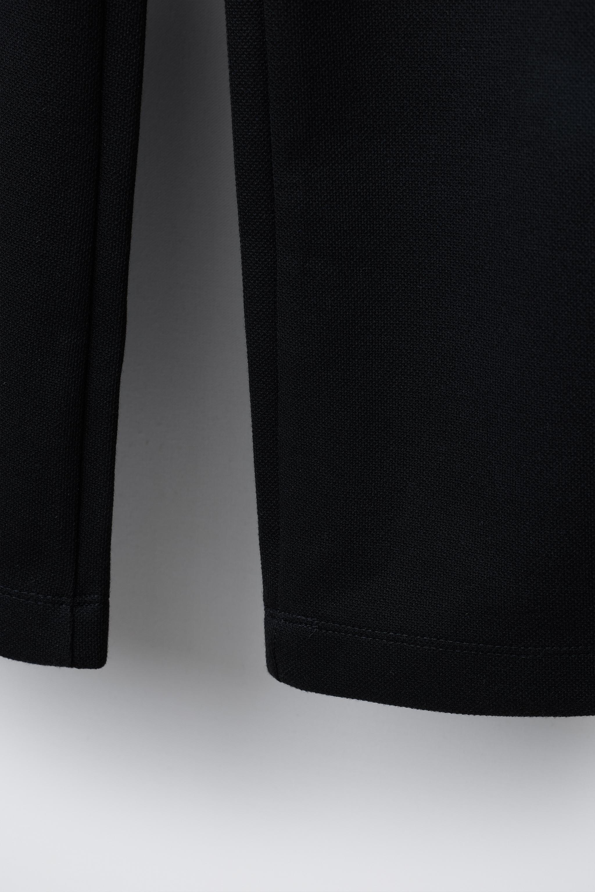 BUCKLED SUIT PANTS