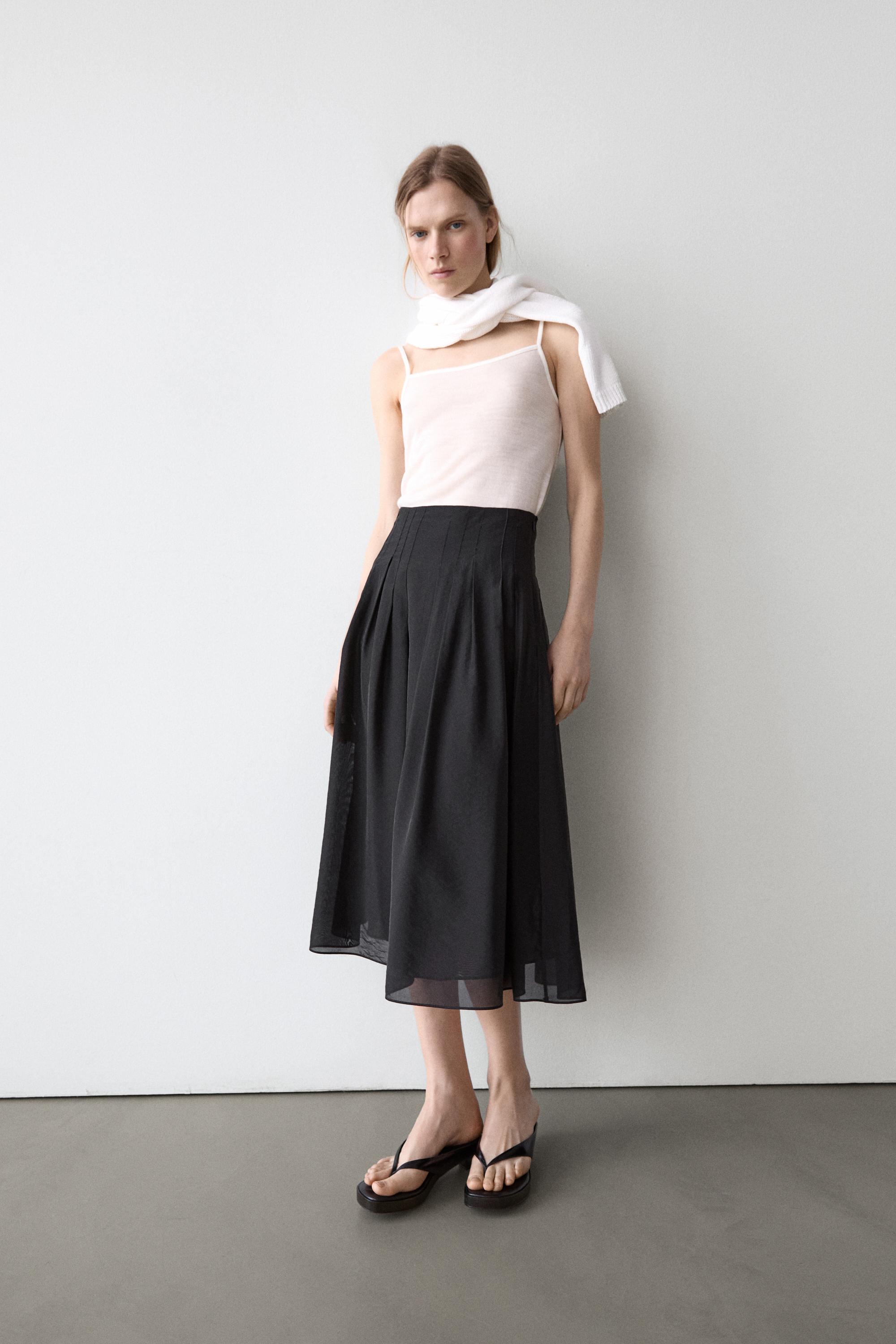 Flowing midi skirt with pintucks