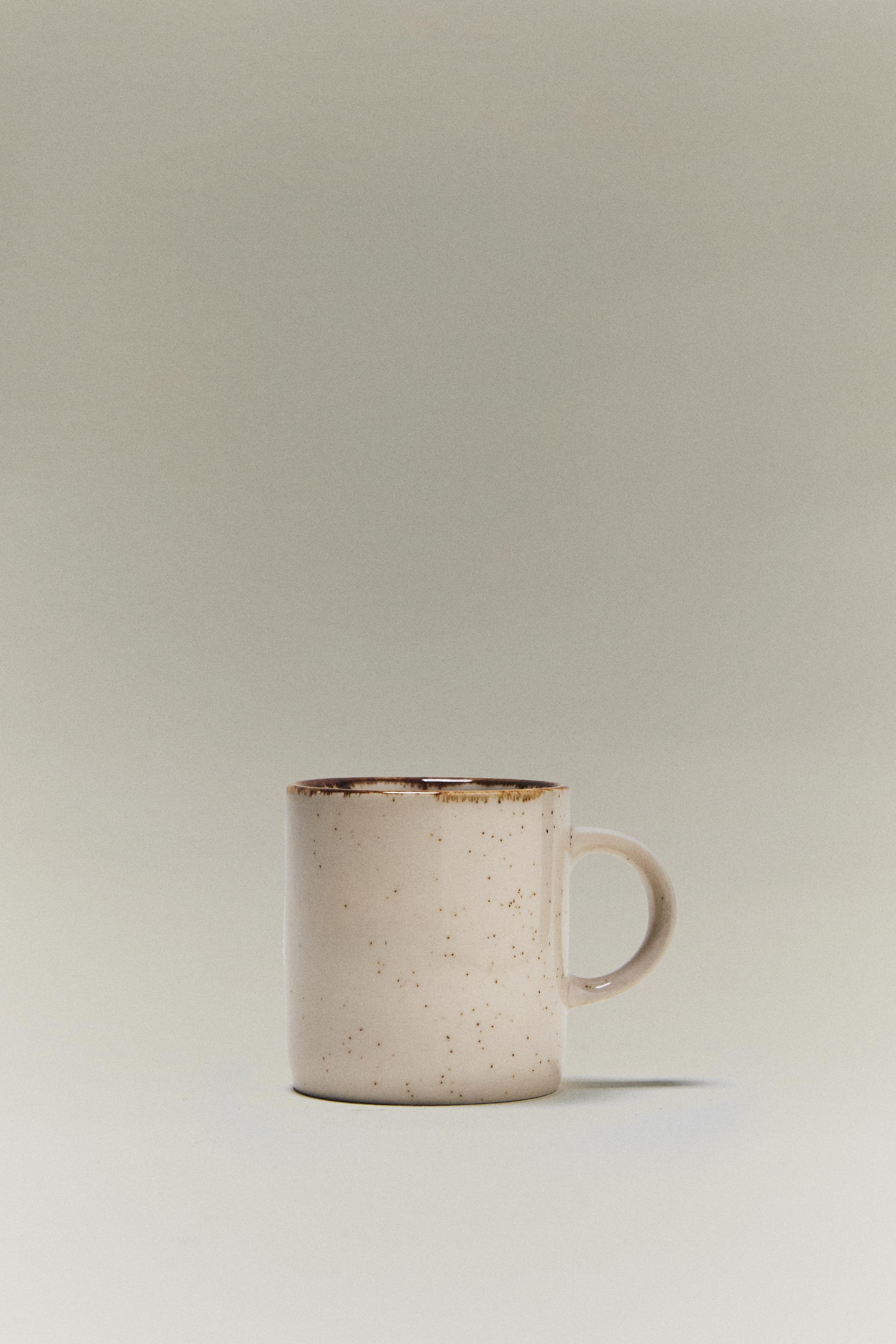 PORCELAIN MUG WITH ANTIQUE FINISH RIM