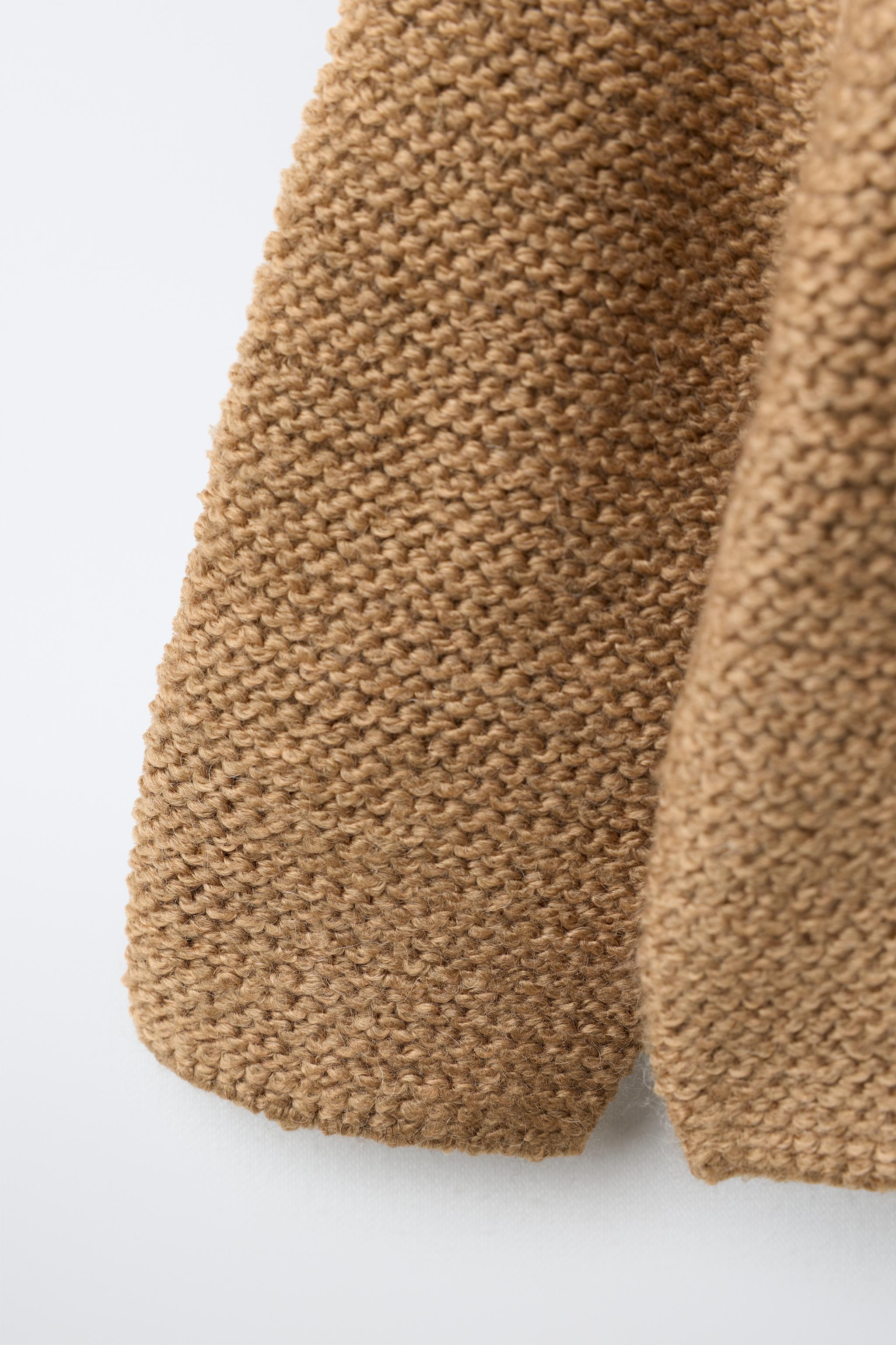 GILET EN MAILLE UNIE