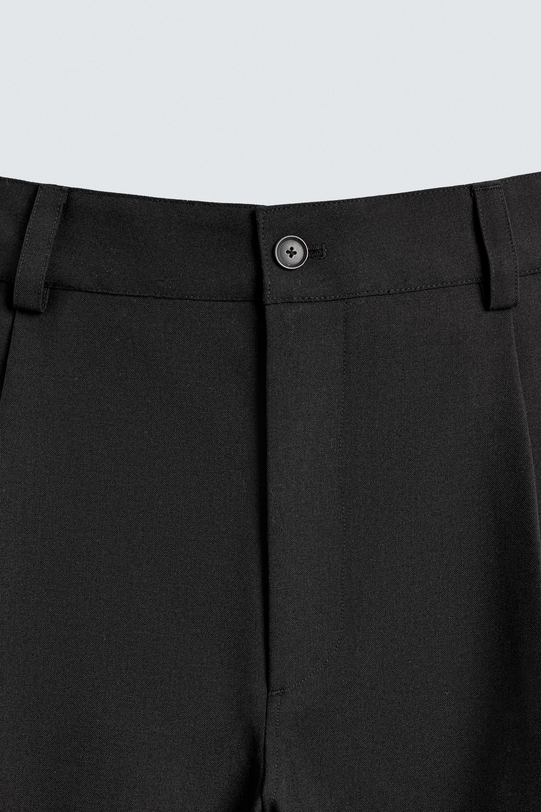 PLEATED BALLOON FIT PANTS