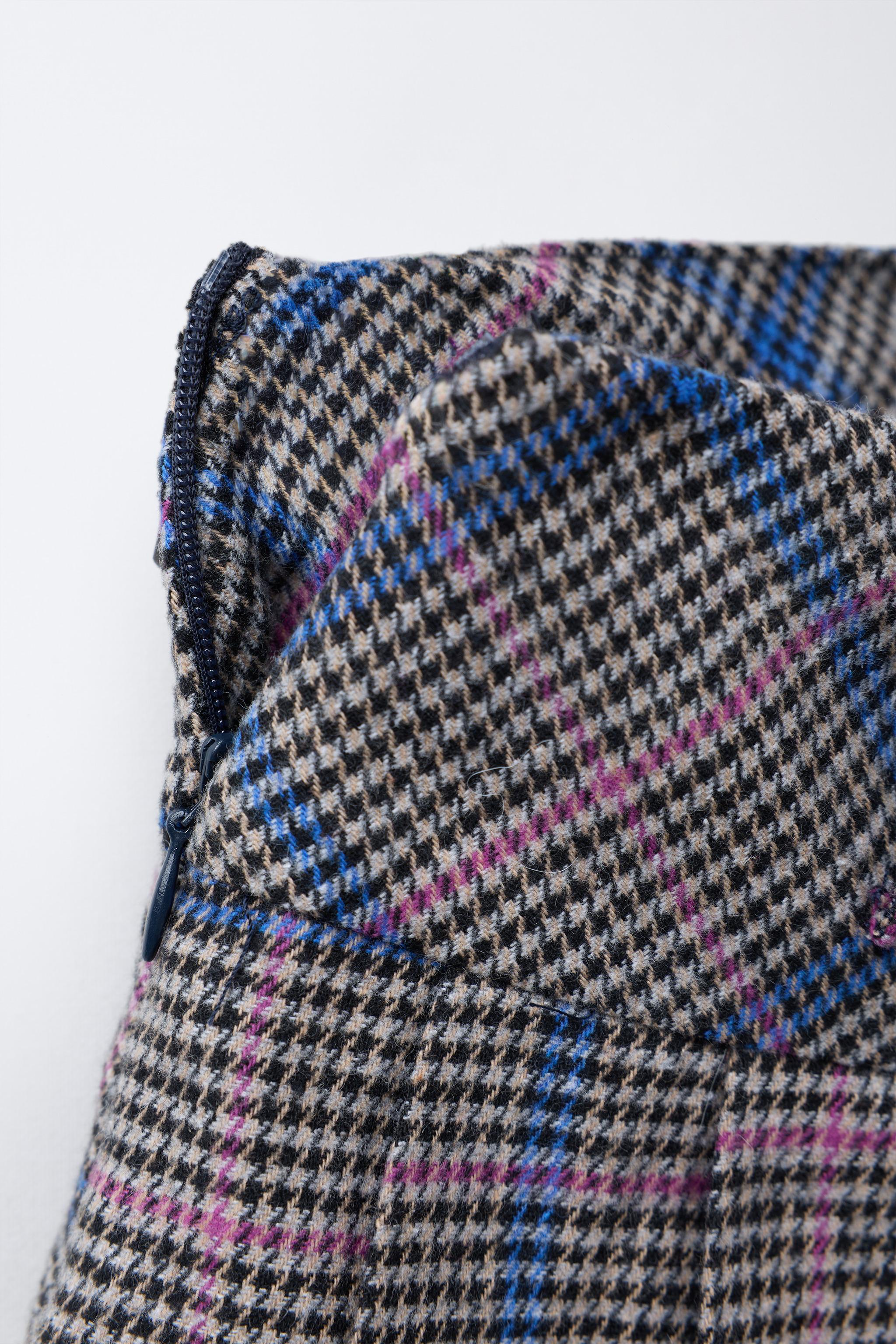 PLAID PLEATED SKIRT WITH STUDDED BELT