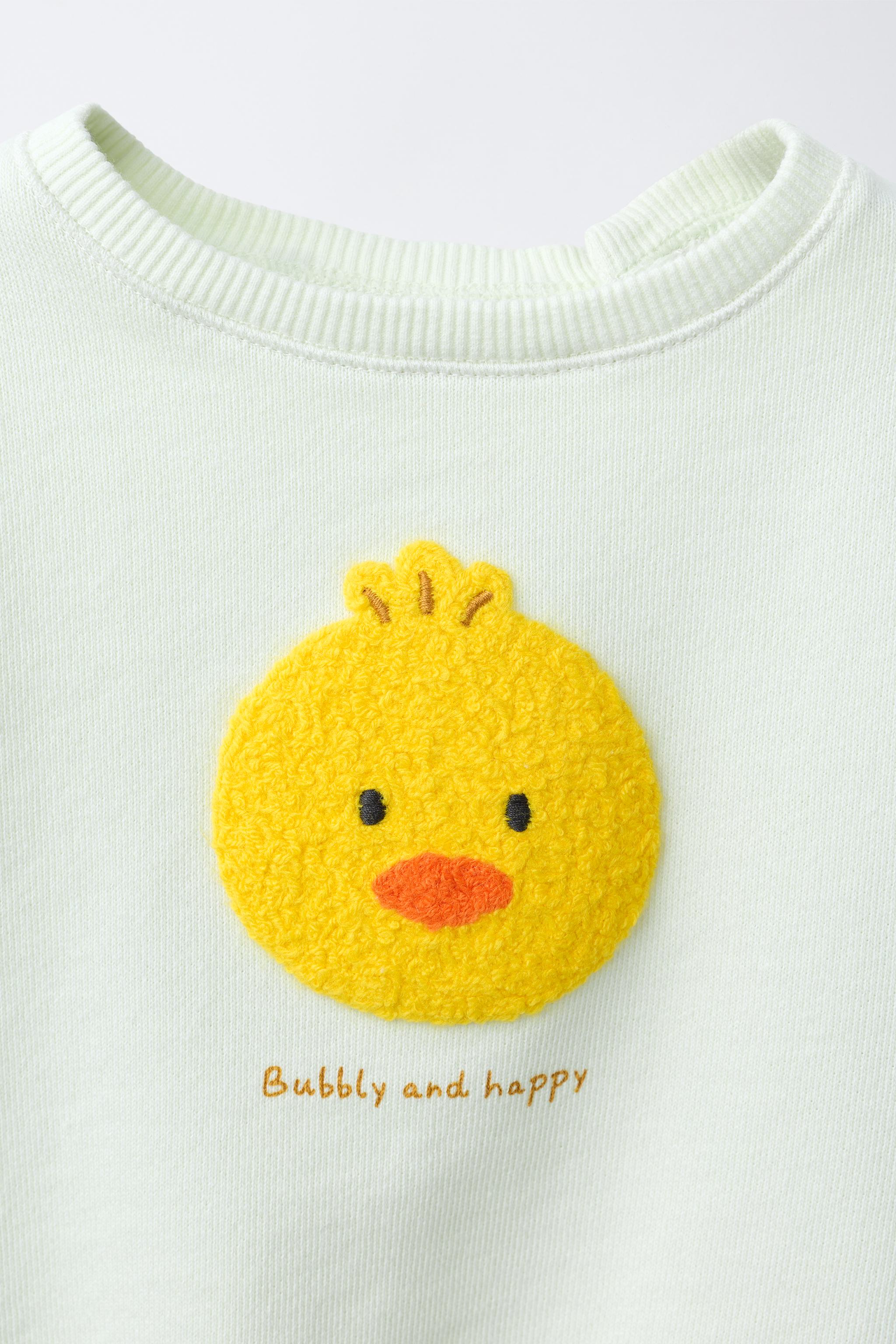SWEAT POUSSIN BRODÉ EN VELOURS BOUCLÉ