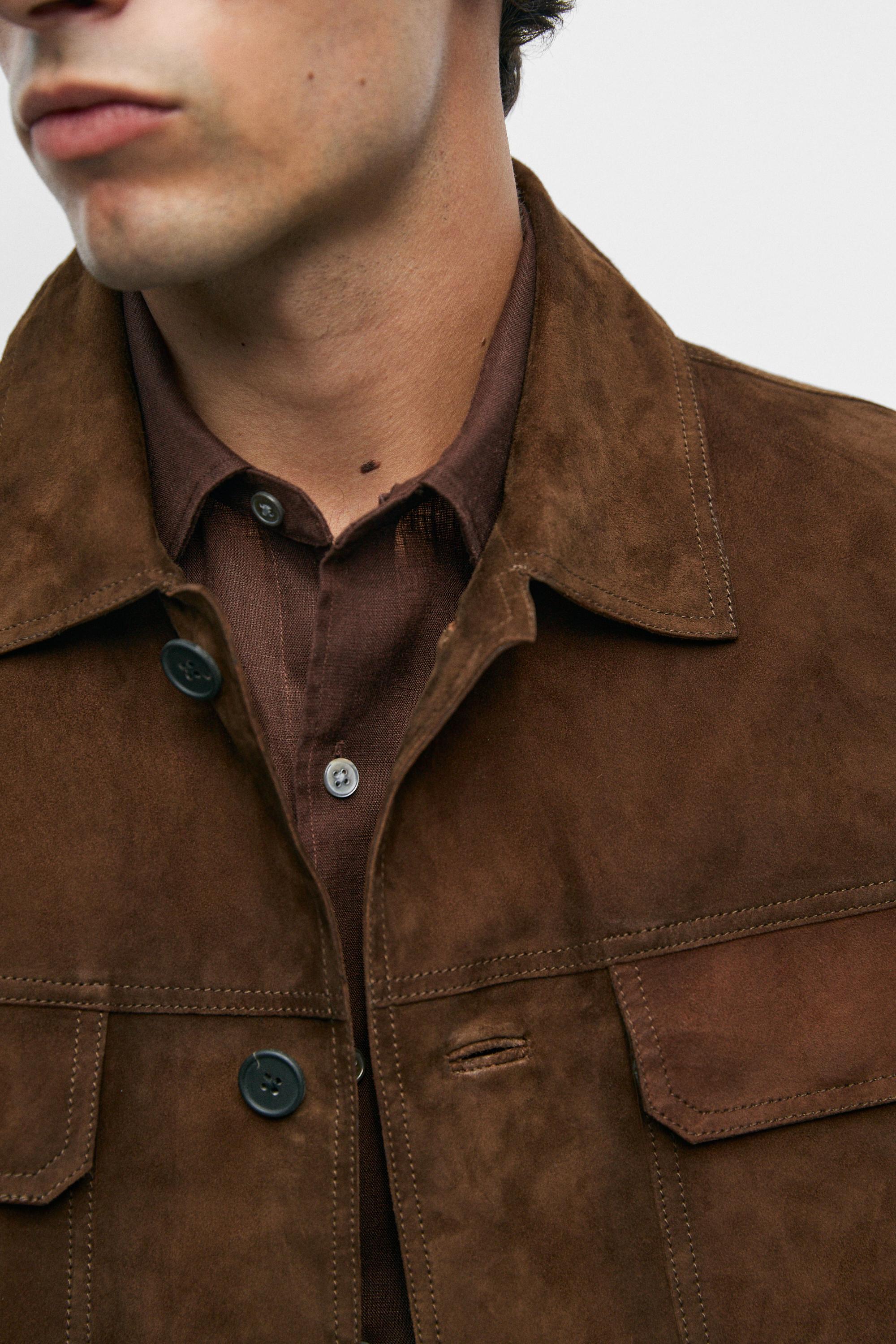 Veste avec poches en cuir et daim