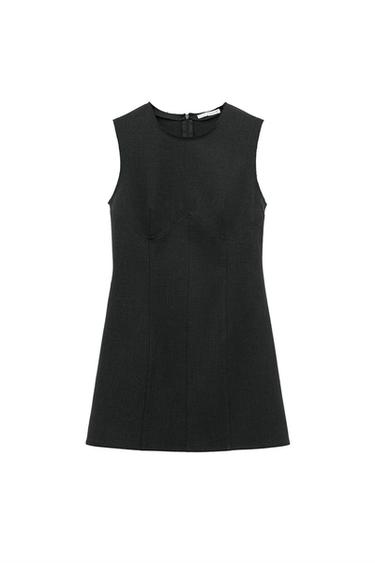 Front view of a sleeveless black dress with a back zip fastening.