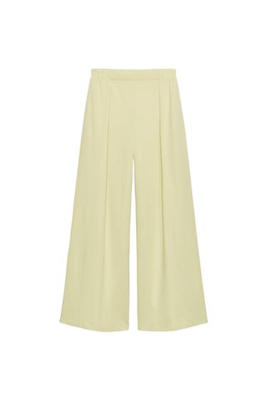 بنطلون إنترلوك - ليموني فاتح الخاص بـ Zara