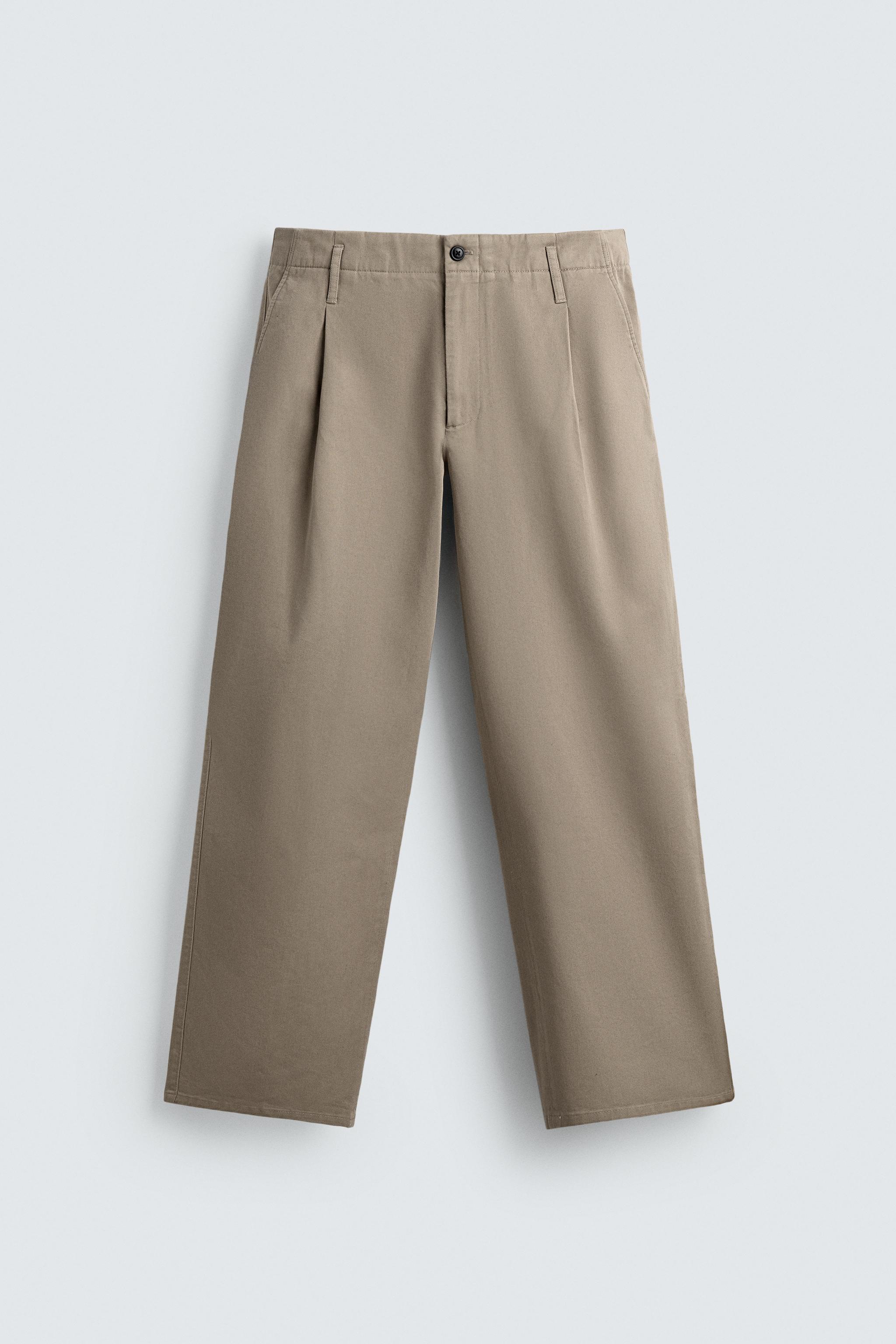 PANTALON CHINO À PLIS