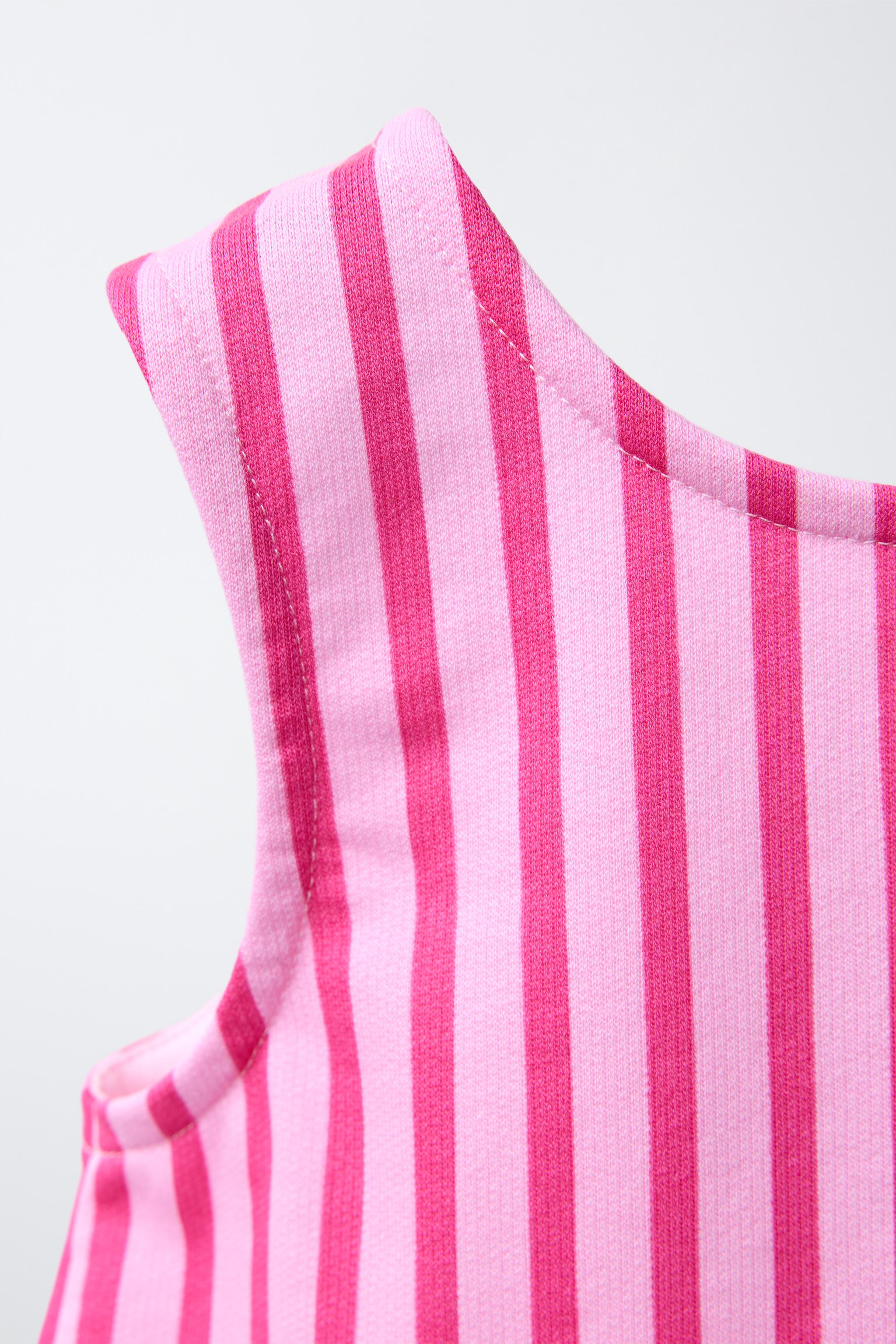 STRIPED PEPLUM TOP WITH CONTRAST LACE