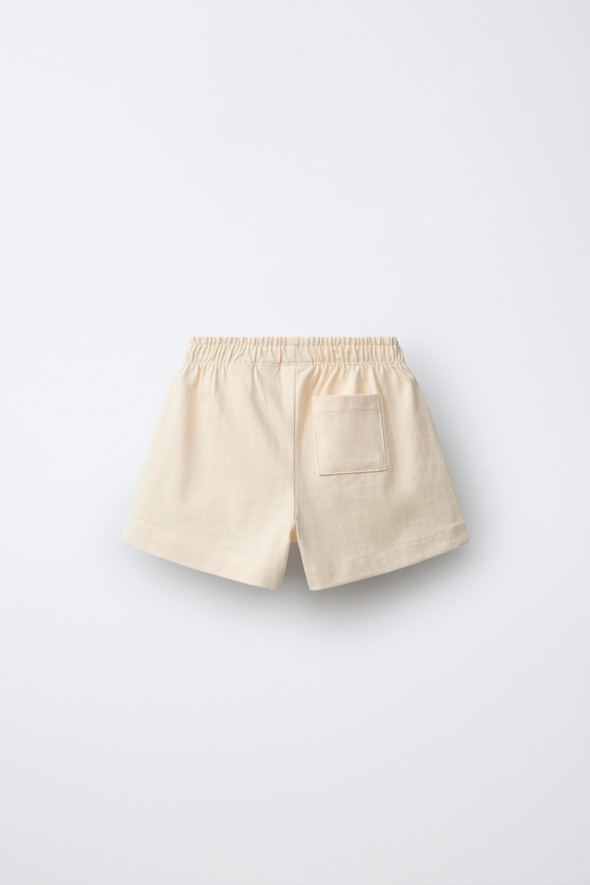 HEAVY WEIGHT FLORAL PLUSH SHORTS — Mid-ecru