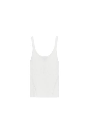 Front view of a fitted blue top with a round neckline and wide straps.