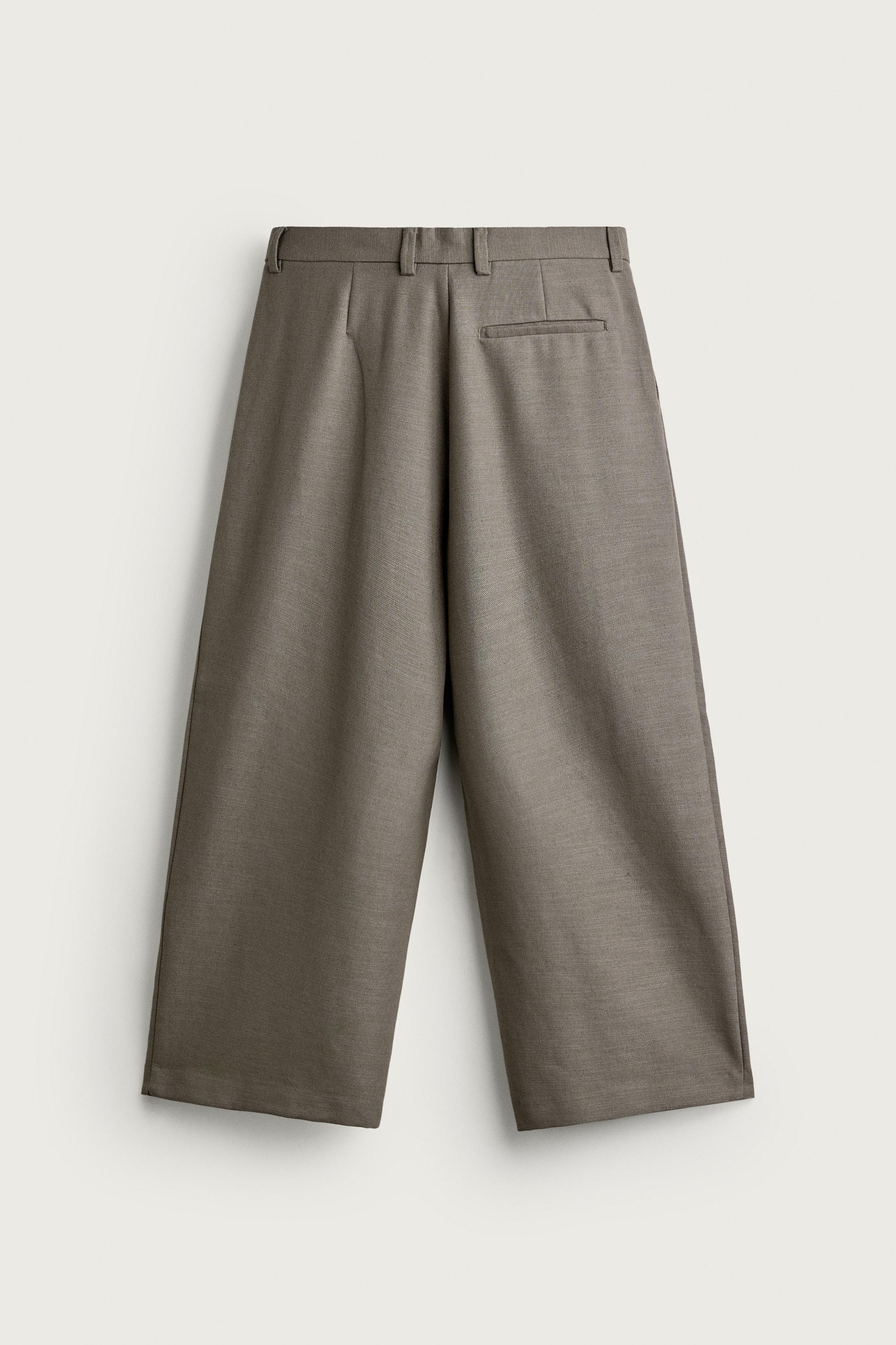 RELAXED FIT STRUCTURED PLEATED PANTS