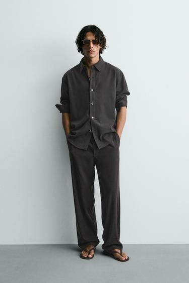 FLUID RELAXED FIT TROUSERS - Black by Zara
