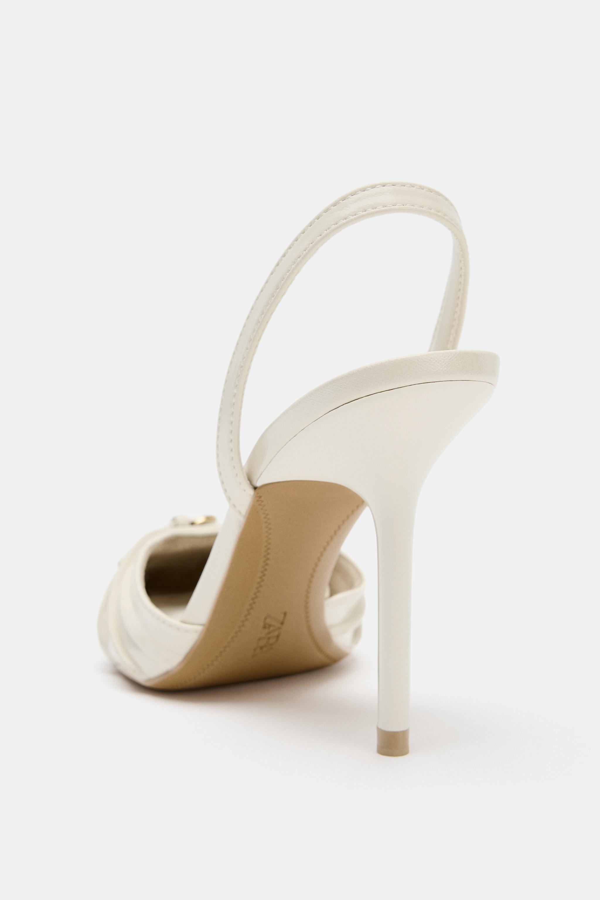 BUCKLED SLINGBACK HEELS
