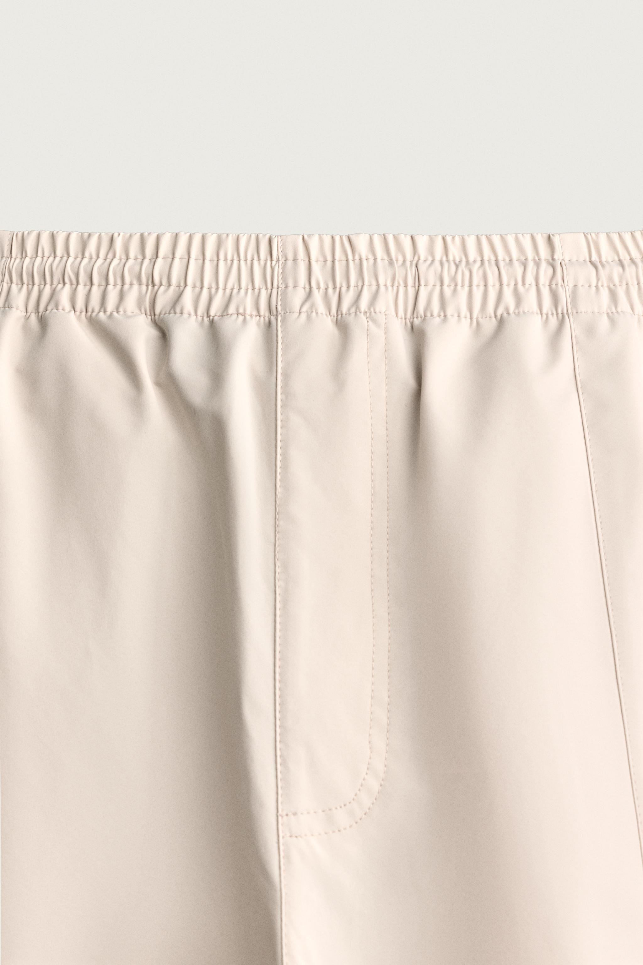 PANTALON TECHNIQUE À CONTRASTES DÉPERLANT