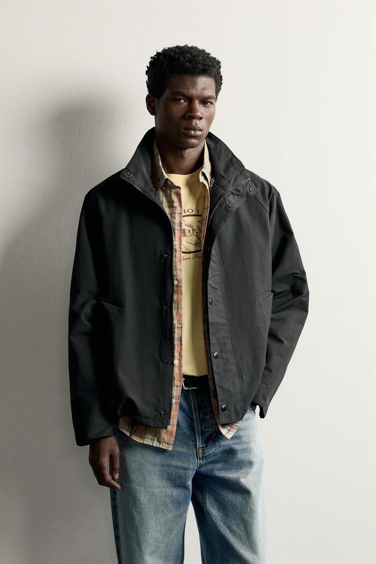WATER-REPELLENT CONTRAST TECHNICAL JACKET — Black