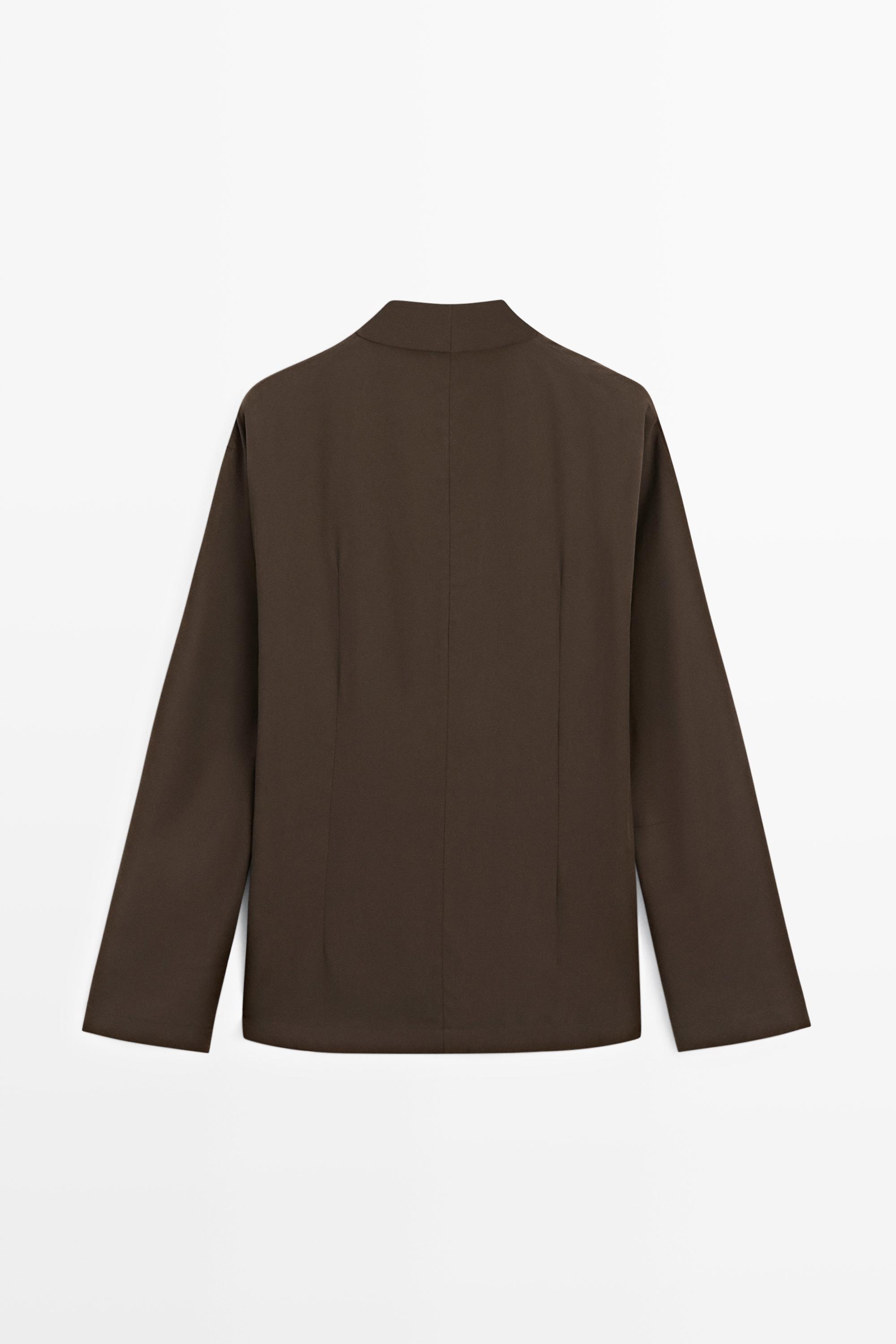 Flowing blouse with draped detail
