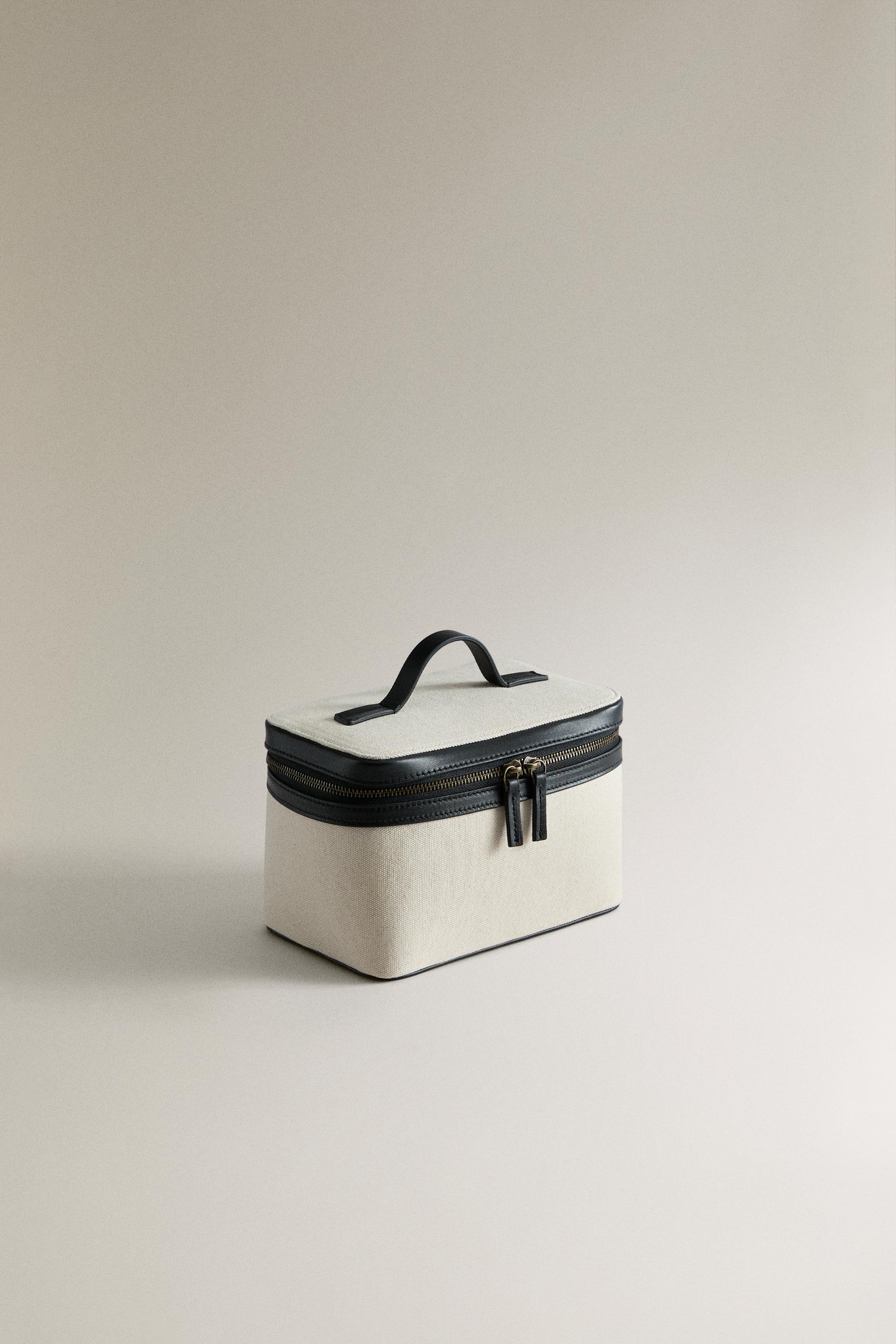 RIGID CANVAS AND LEATHER MAKEUP BAG