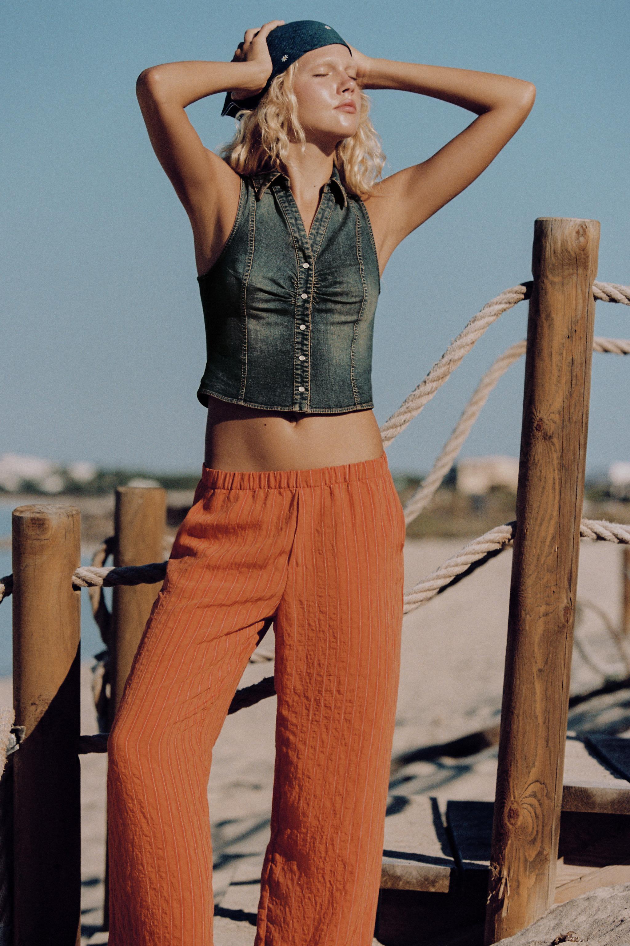 STRIPED FLOWY PANTS — Dark orange