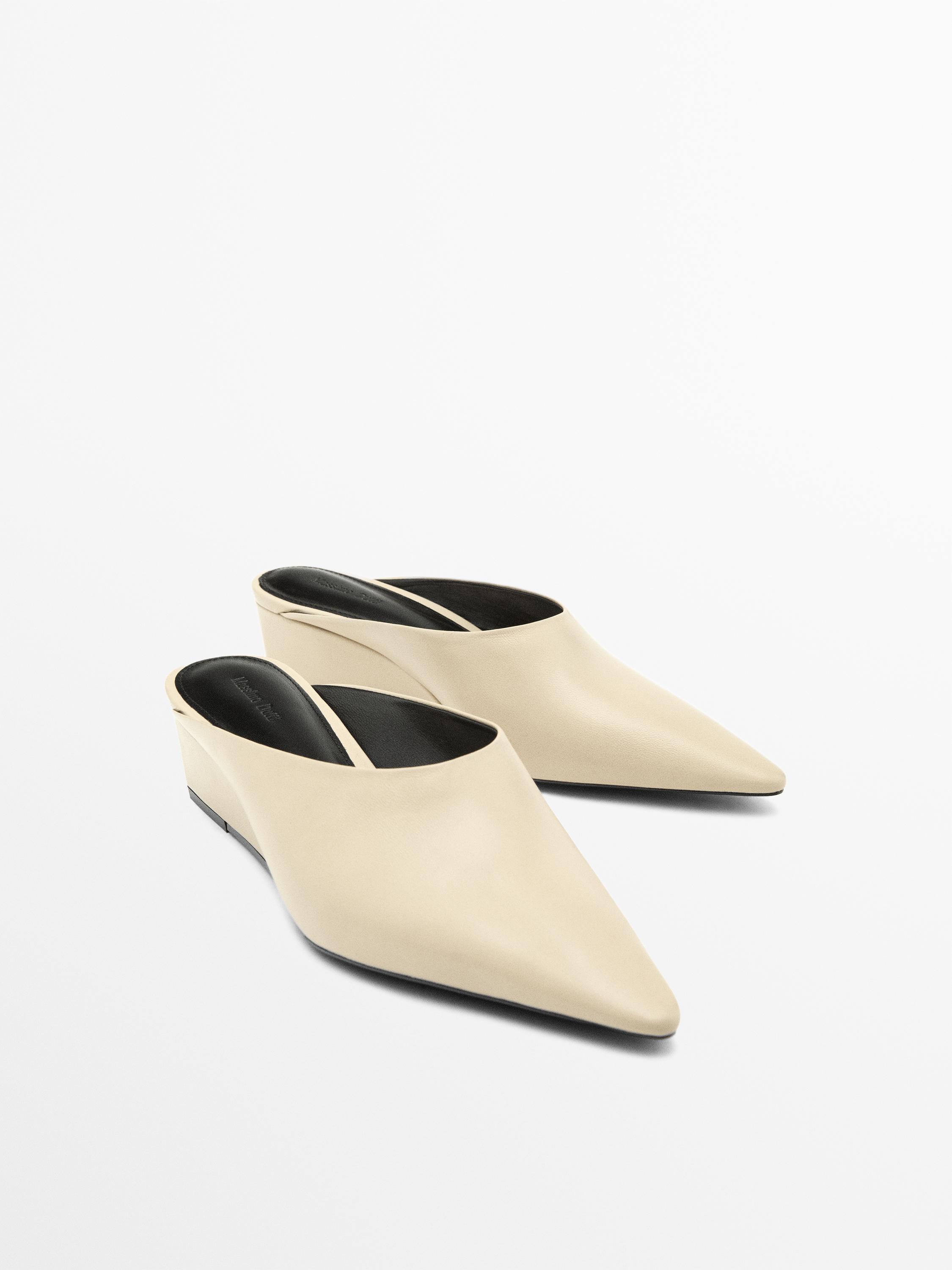 Mules à talon compensé