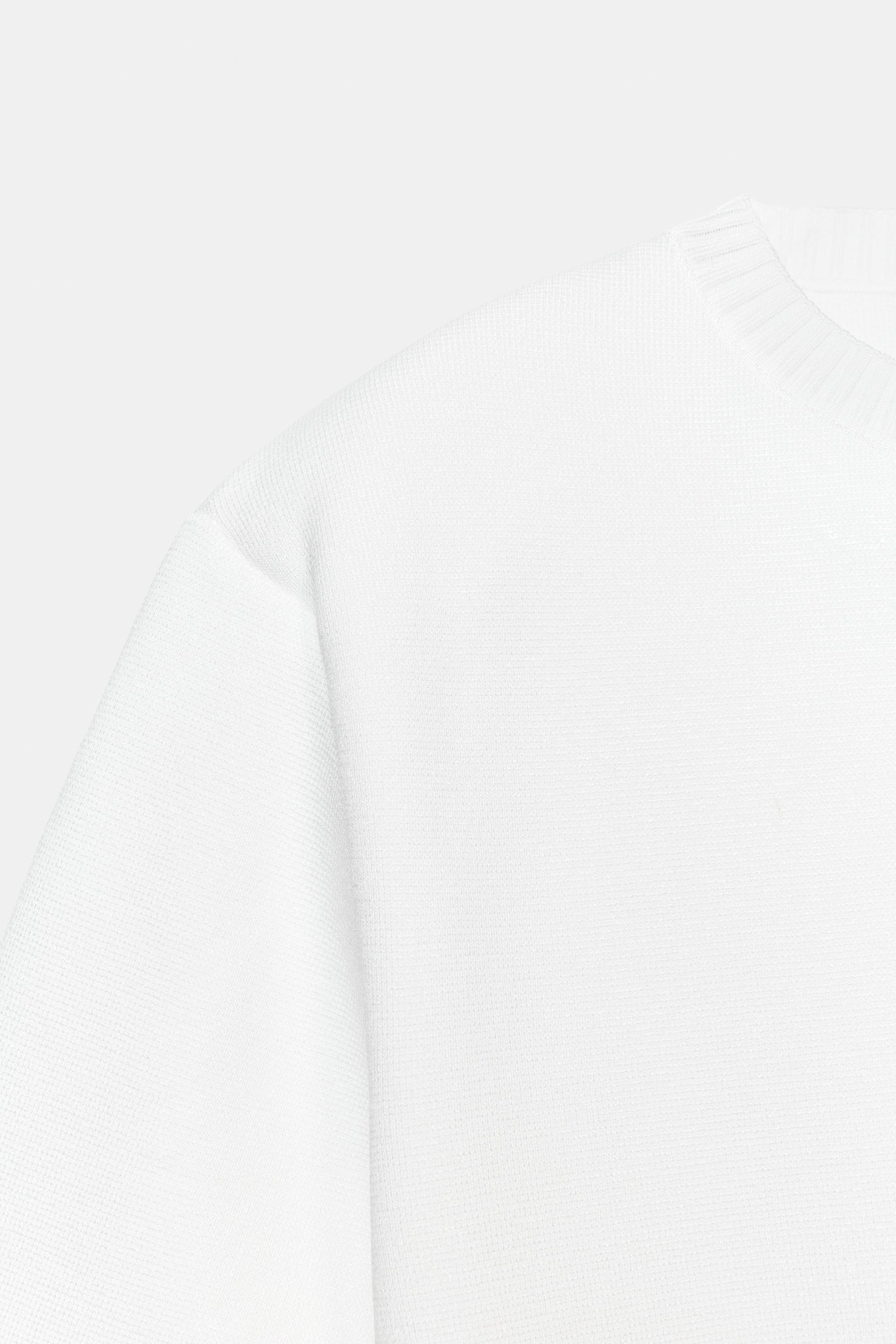 SHOULDER PAD KNIT TOP
