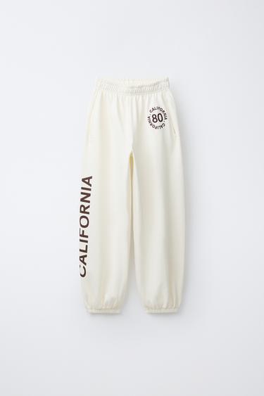 BALLOON PLUSH TROUSERS WITH SLOGAN - Ecru by Zara