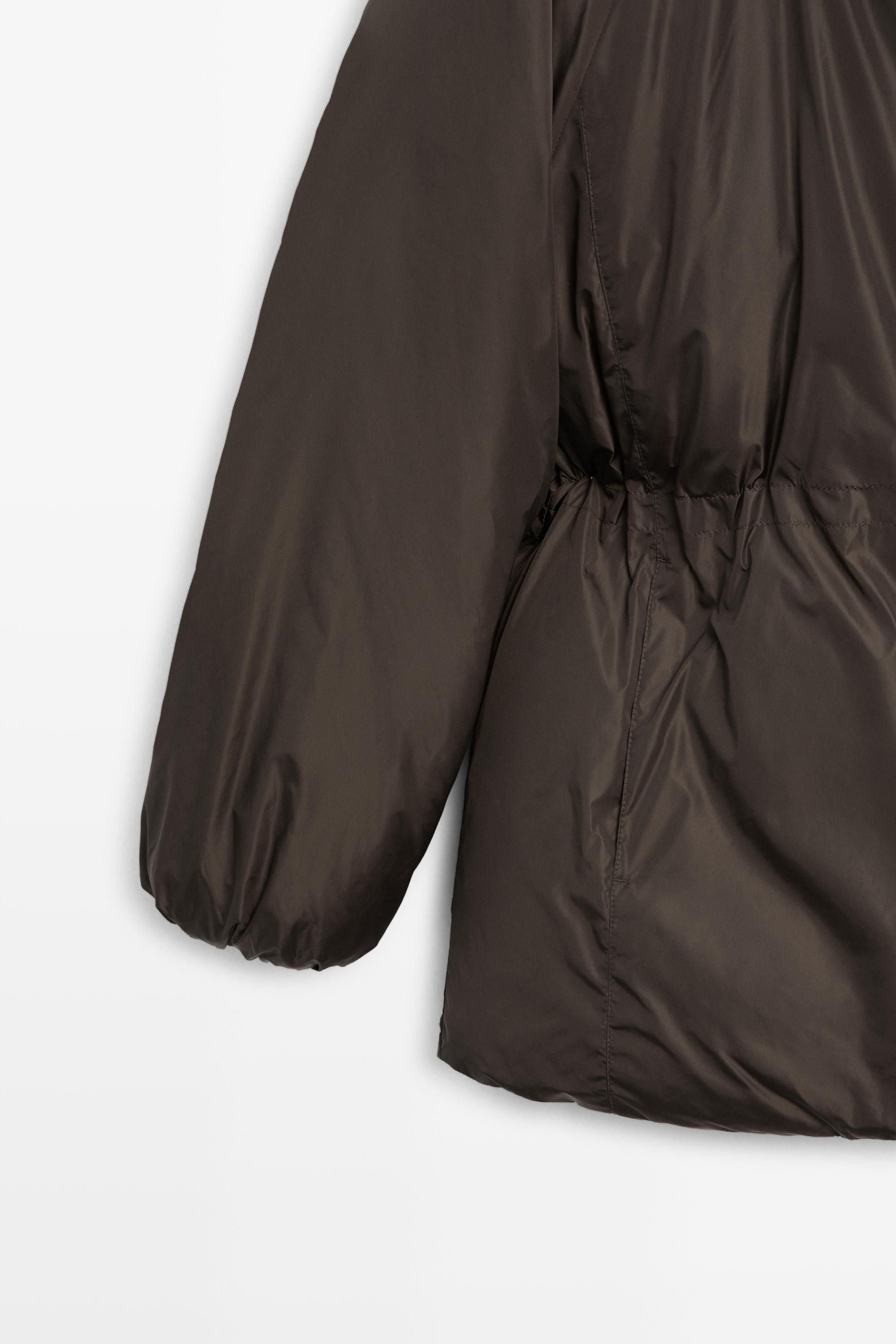 Down jacket with gathered detail