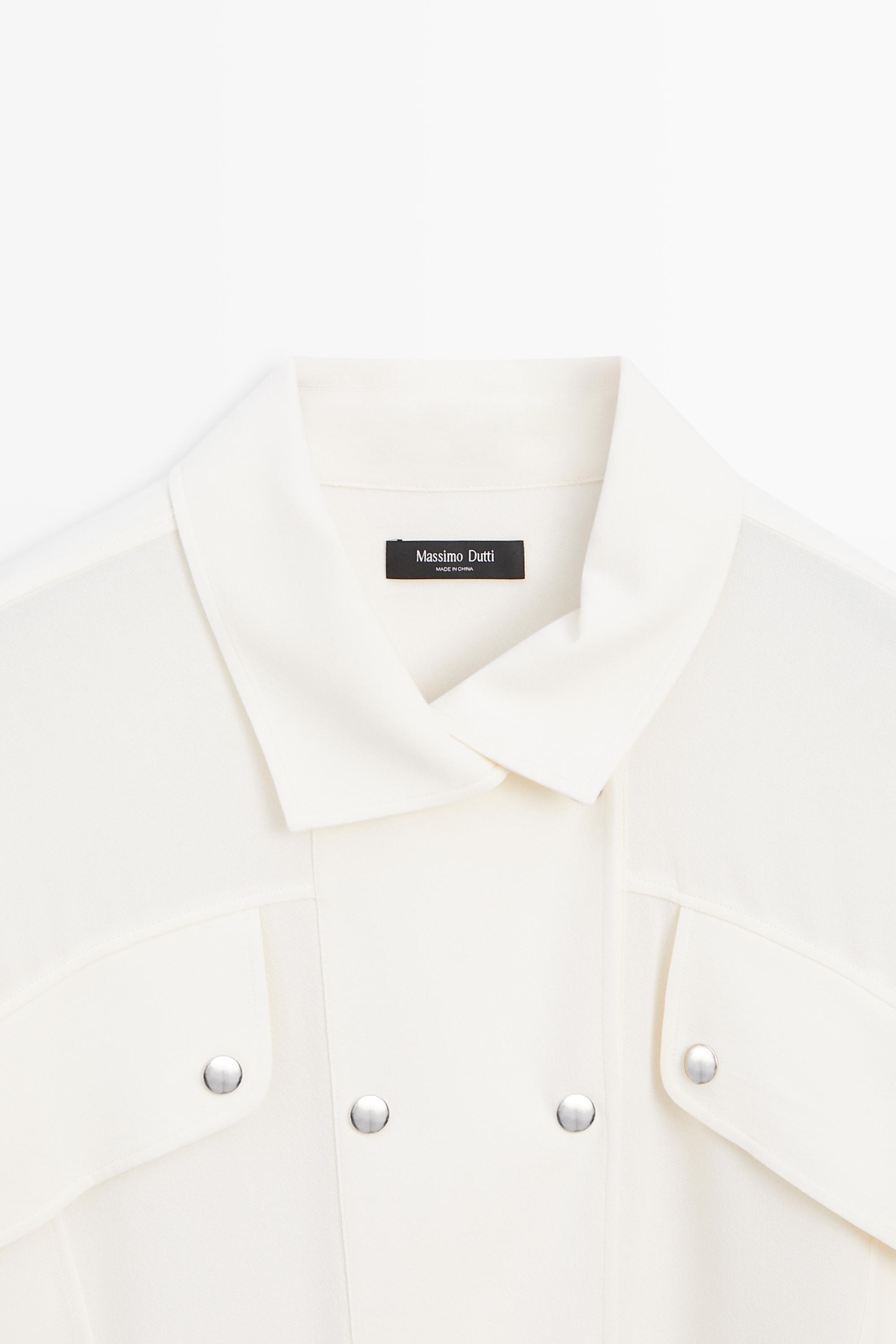 Flowing shirt with button-front detail