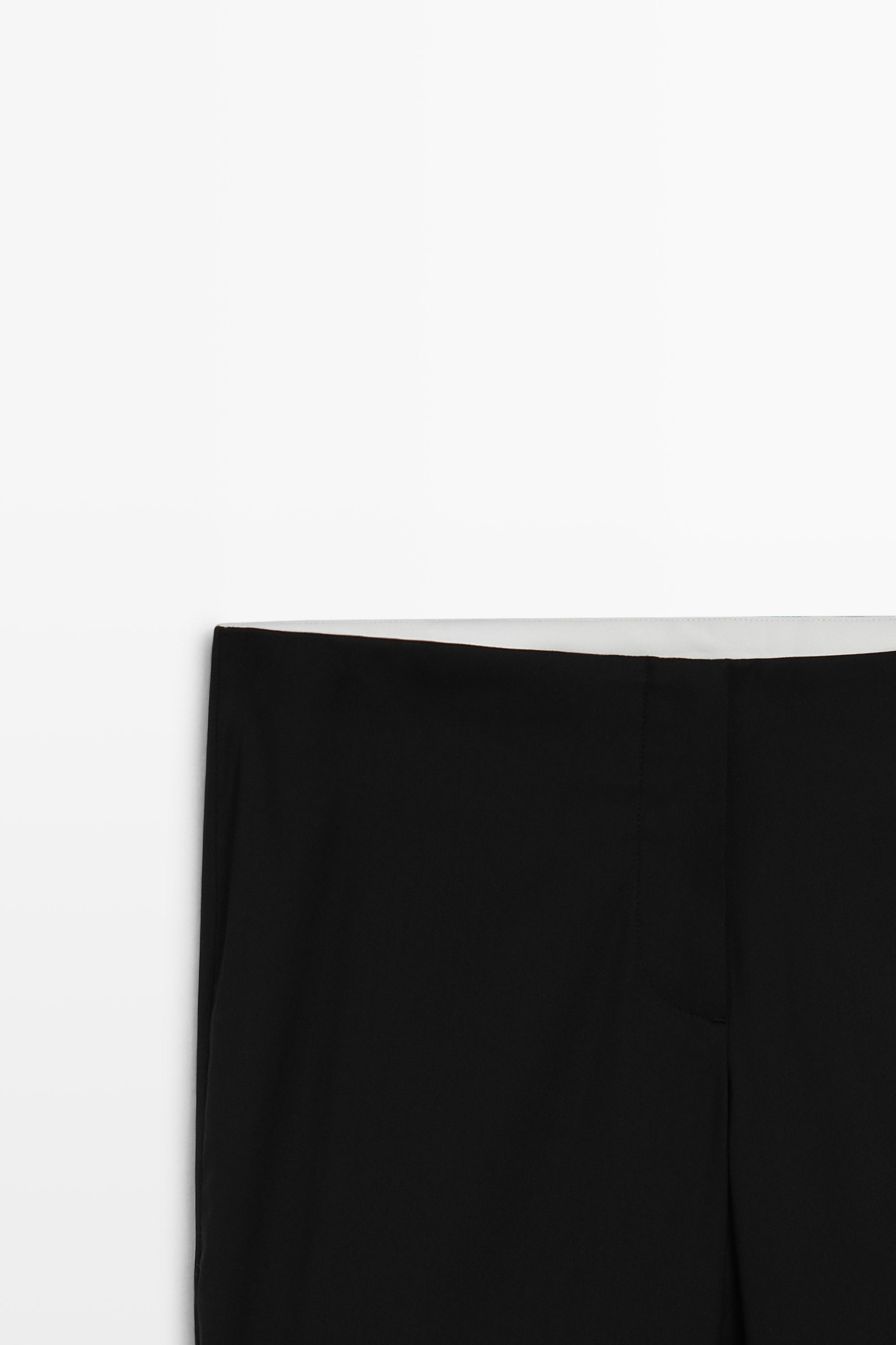 Pantalon flare fit détail bas