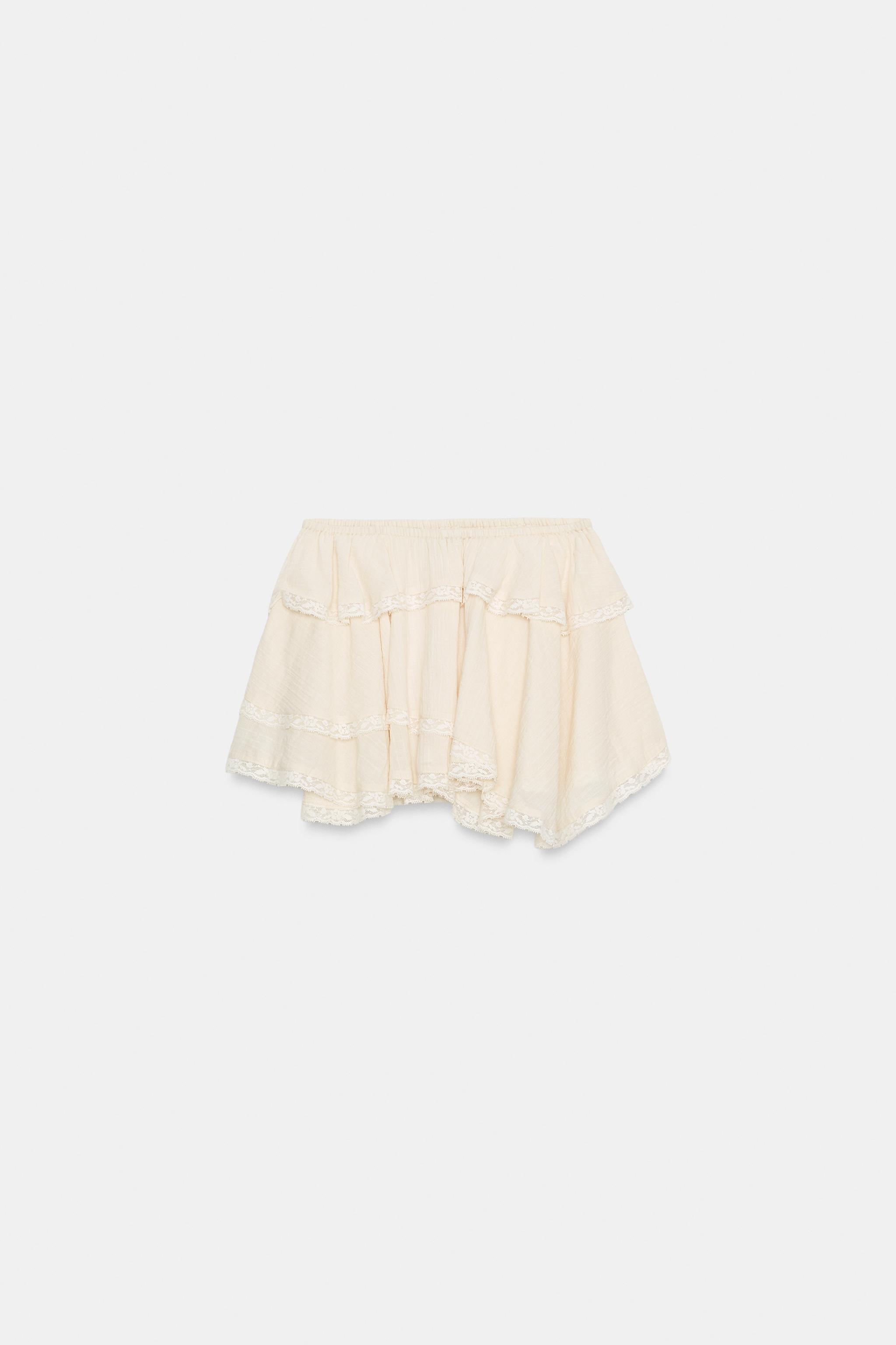 MINI JUPE VOLANTS DENTELLE