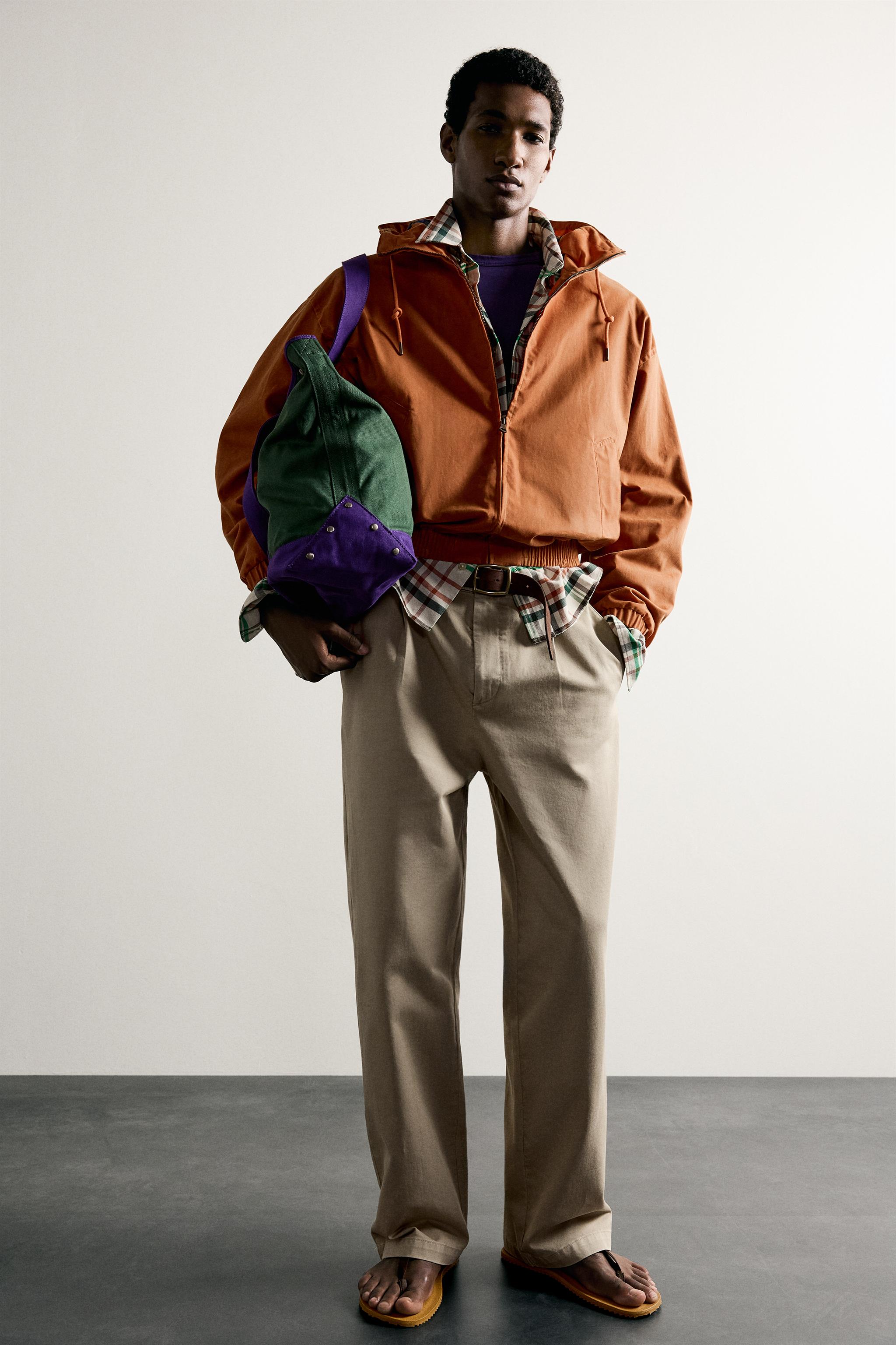 RELAXED FIT PLEATED CHINO PANTS