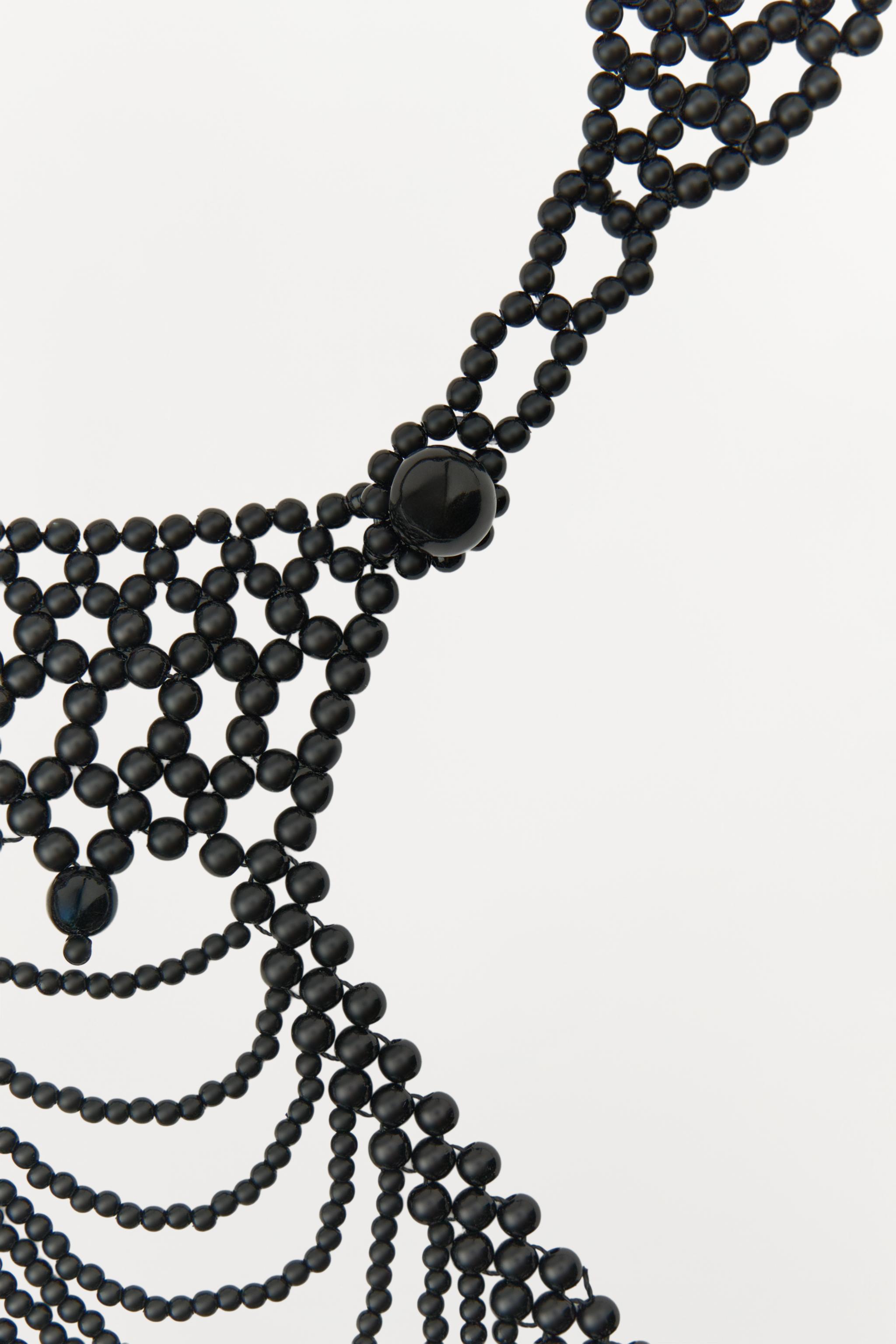 COLLIER CAPE FANTAISIE ÉDITION LIMITÉE